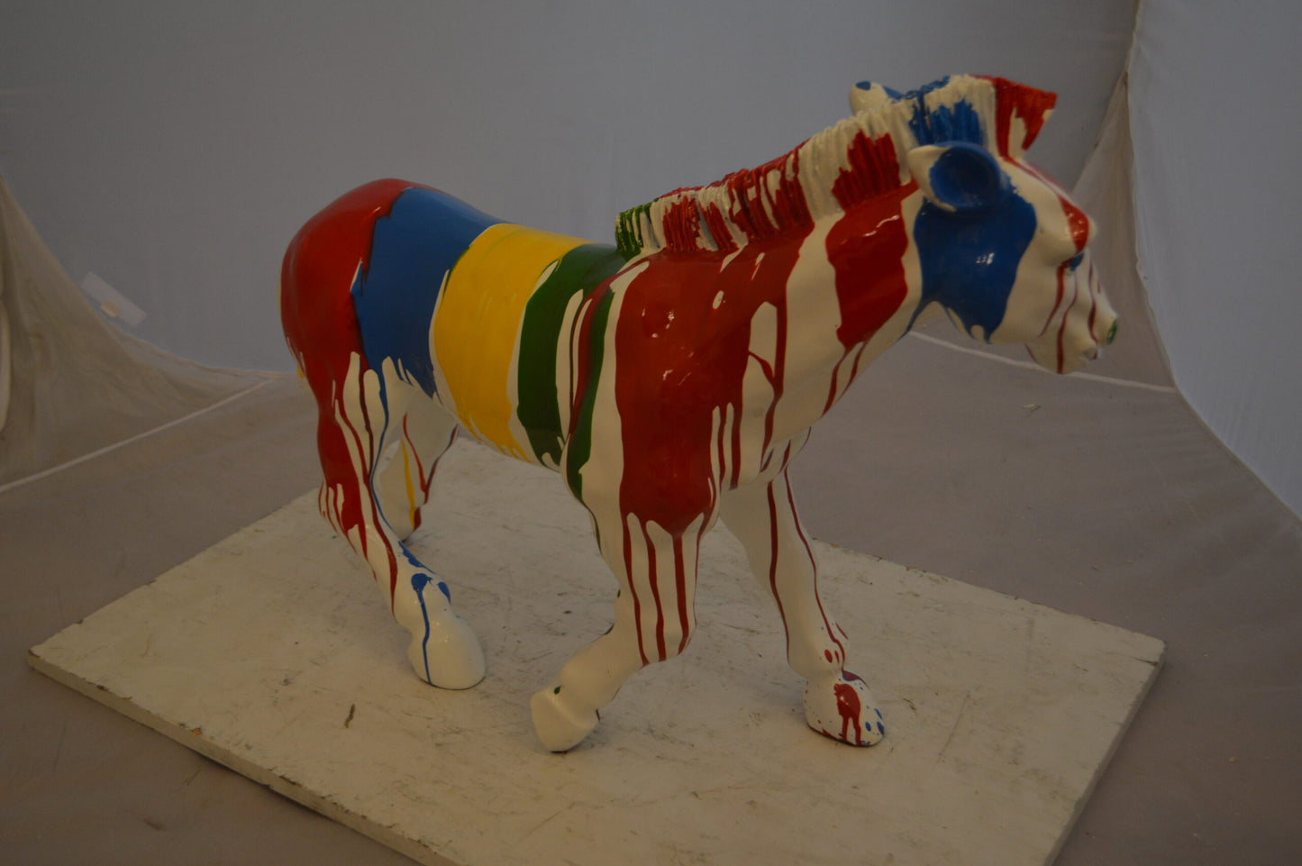 Modern Art Colored Zebra Resin Statue - Size: 29"L x 12"W x 22"H.