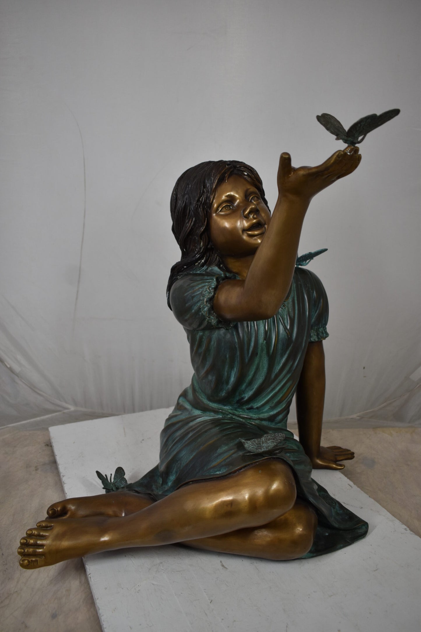 Girl with butterflies, green shirt Bronze Statue Size: 27" x 17" x 24"H