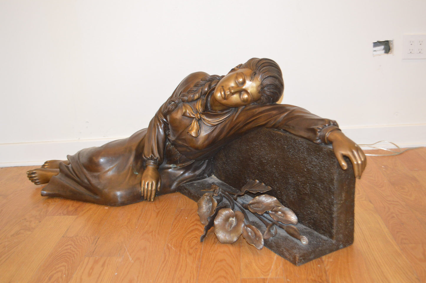 Lady With Flowers on Tombstone Bronze Statue - Size: 62"L x 32"W x 24"H.