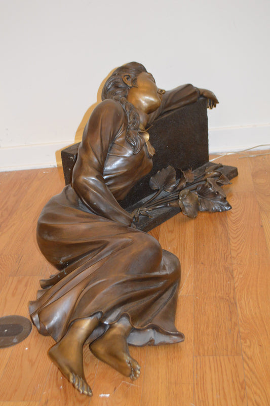 Lady With Flowers on Tombstone Bronze Statue - Size: 62"L x 32"W x 24"H.
