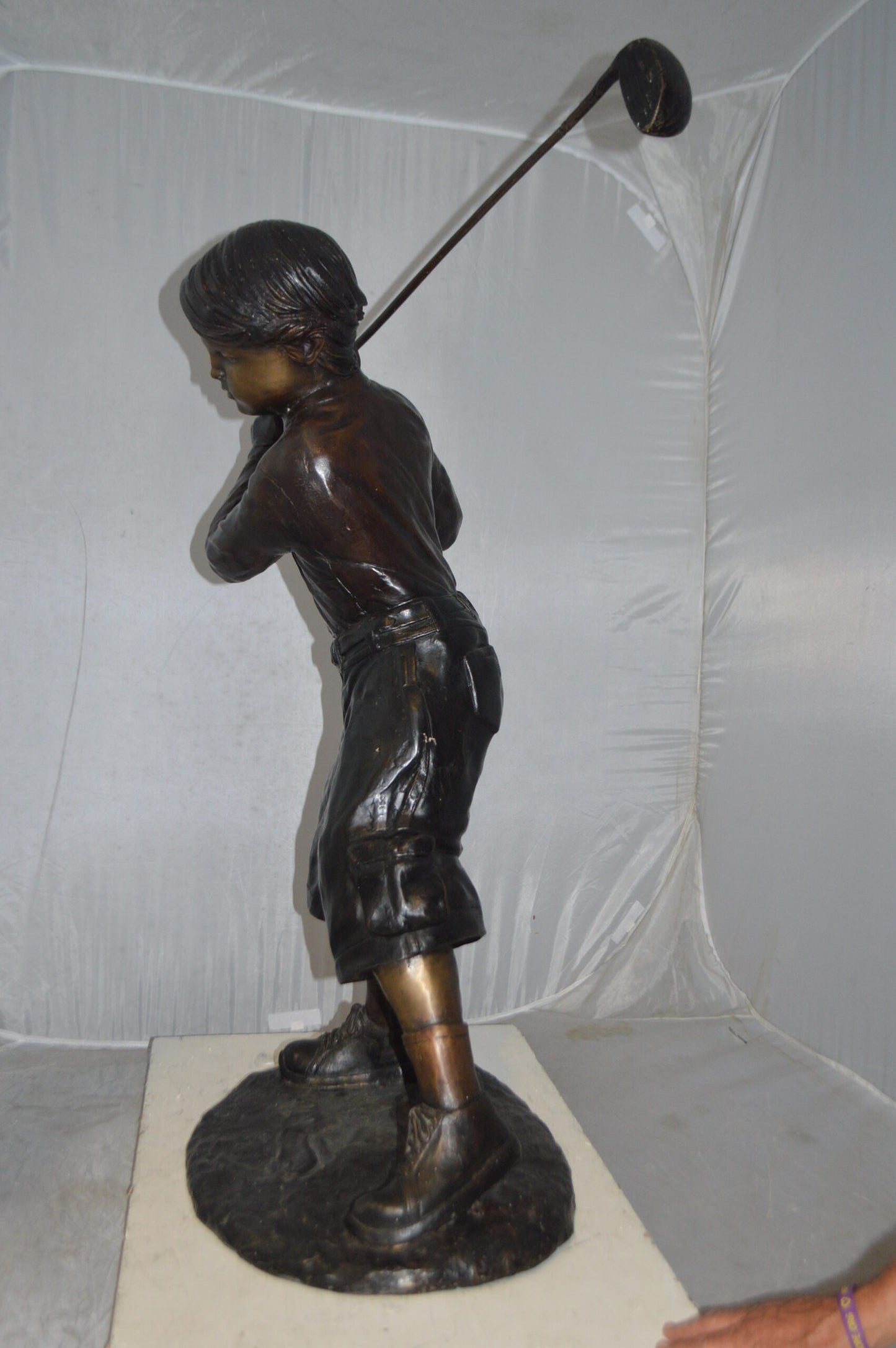 Young Boy Plays Golf Bronze Statue -  Size: 19"L x 21"W x 45"H.