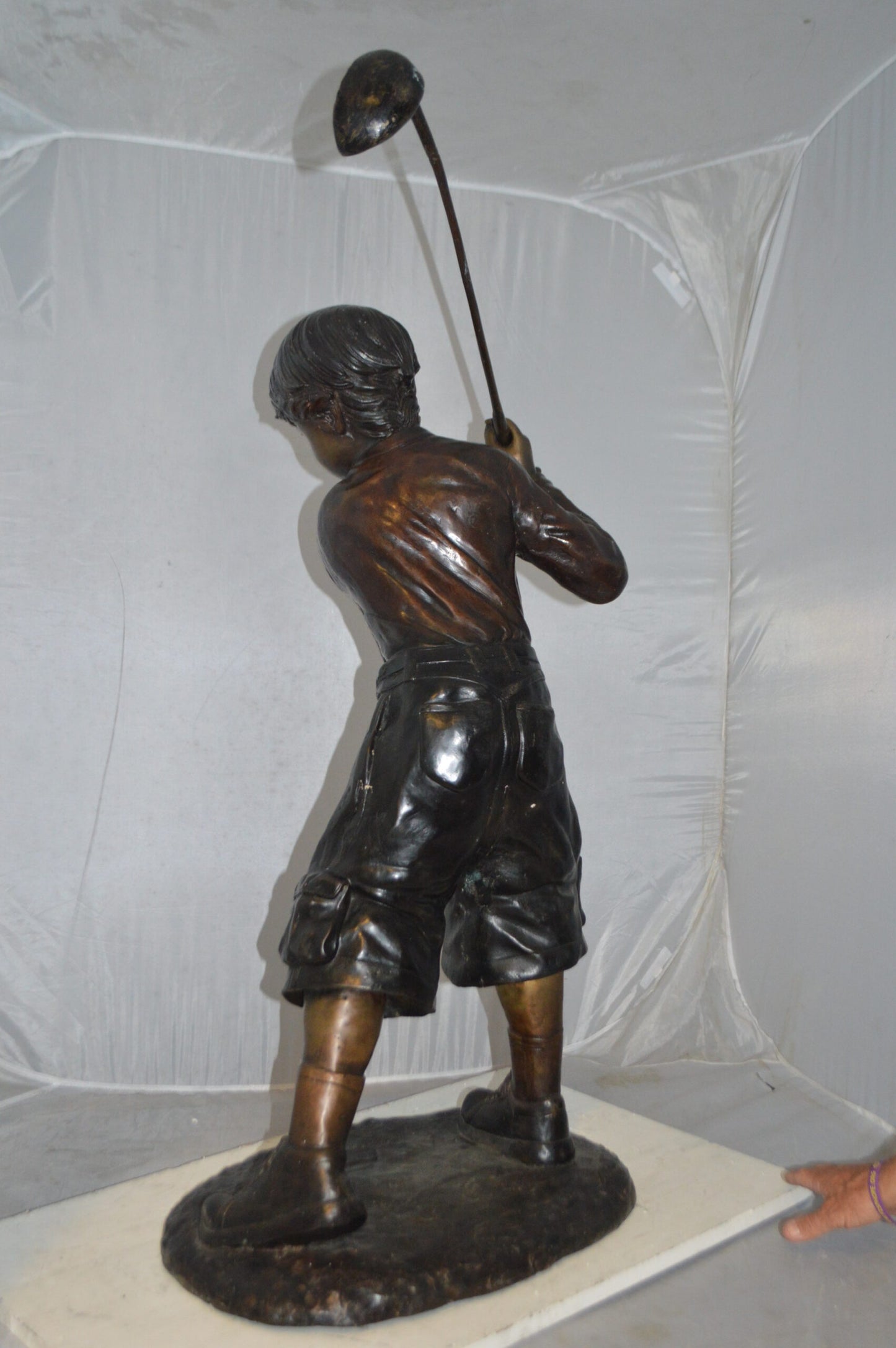 Young Boy Plays Golf Bronze Statue -  Size: 19"L x 21"W x 45"H.