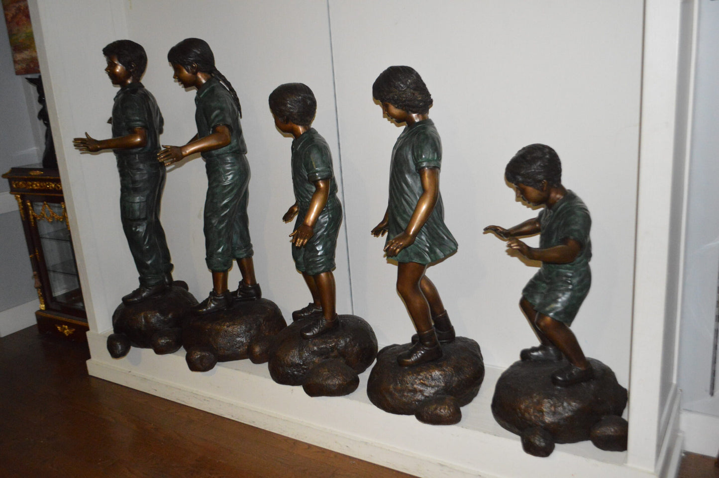 Five Kids Walking on Rocks Bronze Statues -  Size: "L x "W x "H.