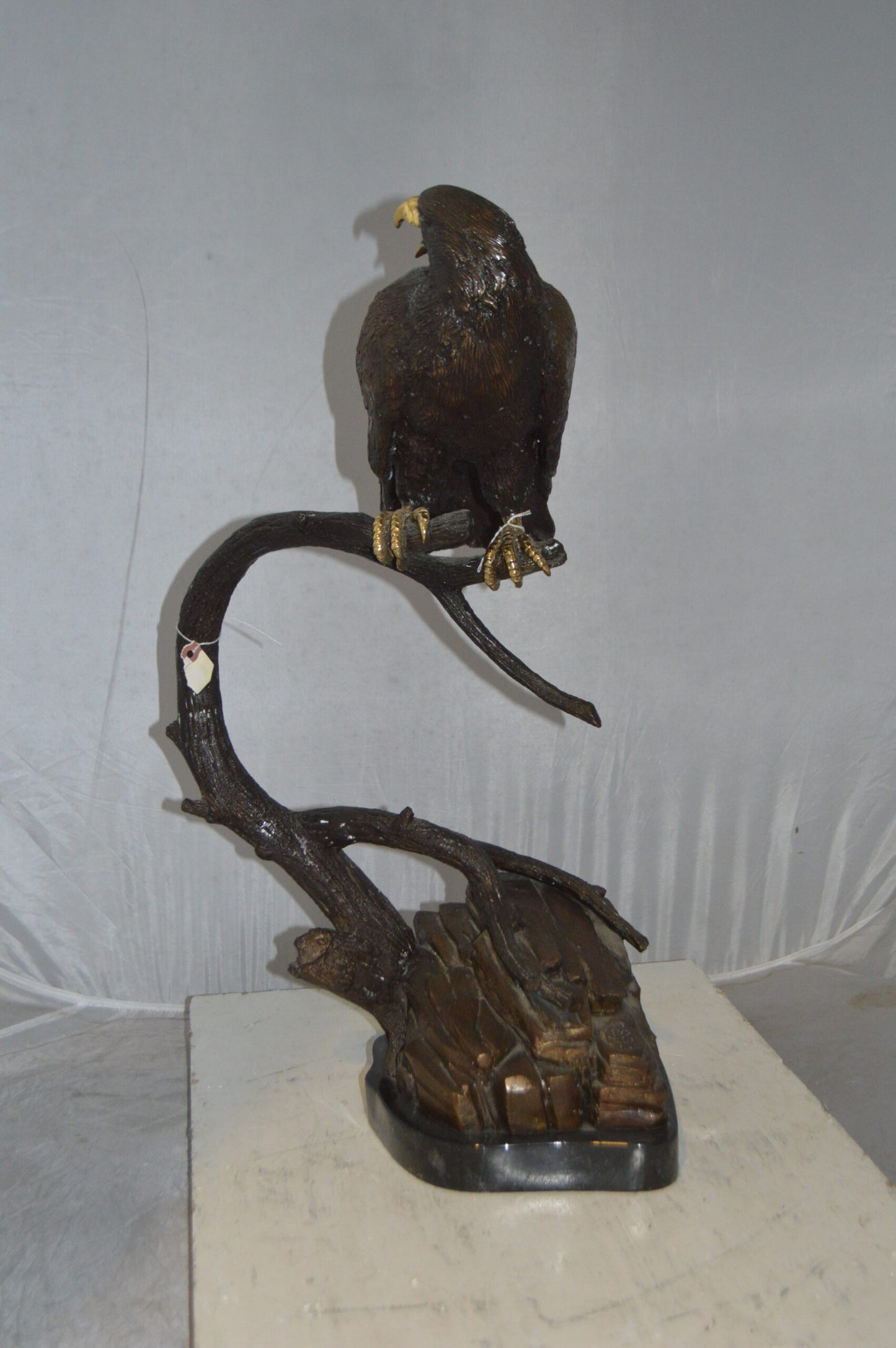 Falcon On a Branch Bronze Statue - Size: 15"L x 15"W x 28"H.