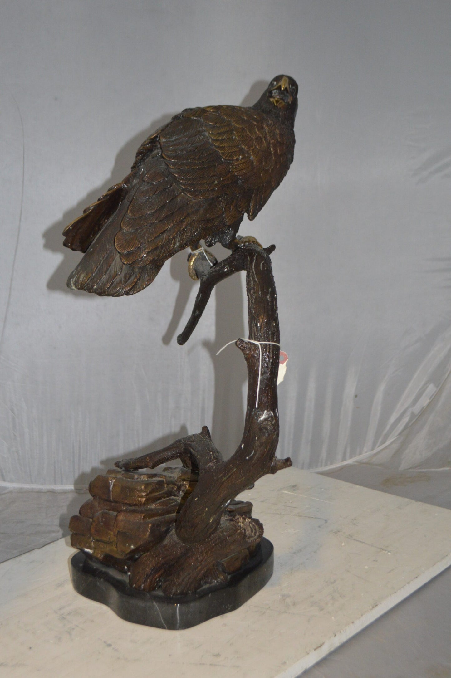 Falcon On a Branch Bronze Statue - Size: 15"L x 15"W x 28"H.