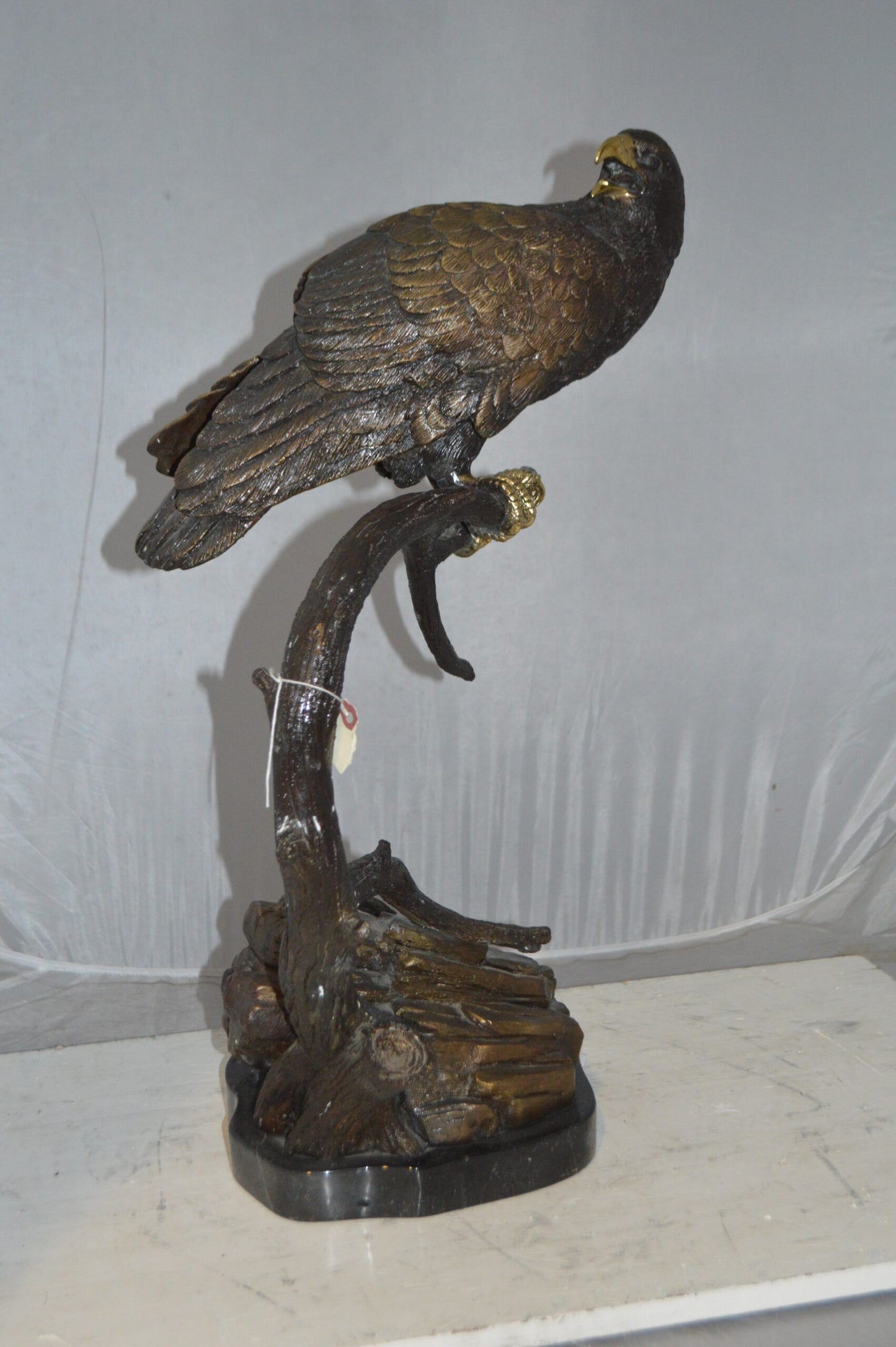 Falcon On a Branch Bronze Statue - Size: 15"L x 15"W x 28"H.