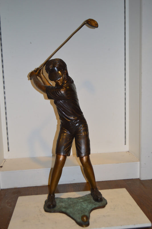 Susan Plays Golf Bronze Statue - Size: 18"L x 23"W x 47"H.