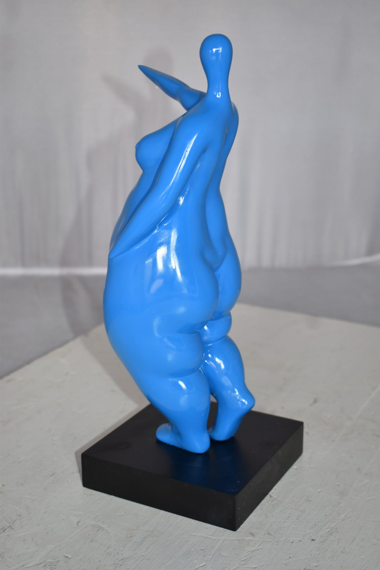 Modern art Voluptuous Blue Lady Hand Forward Resin Statue Size: 8" x 6" x 14"H