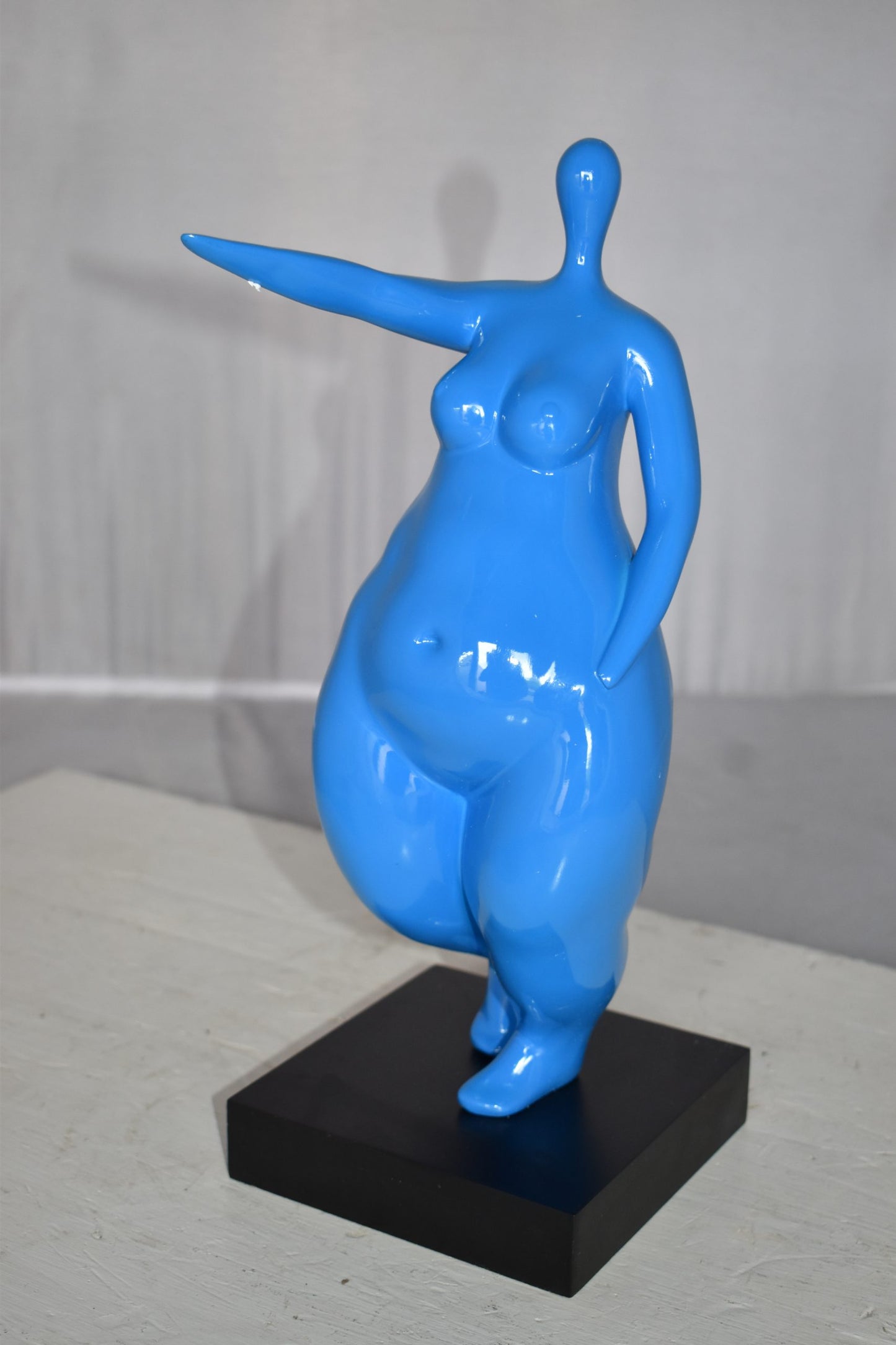 Modern art Voluptuous Blue Lady Hand Forward Resin Statue Size: 8" x 6" x 14"H