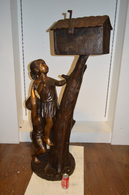 Two Kids Climbing A Mailbox - Size: 30"L x 21"W x 57"H.