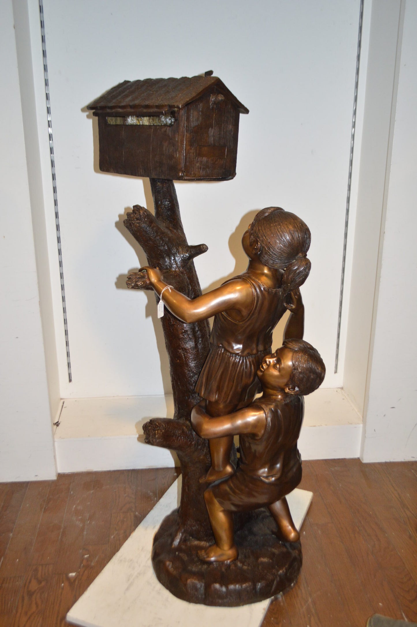 Two Kids Climbing A Mailbox - Size: 30"L x 21"W x 57"H.
