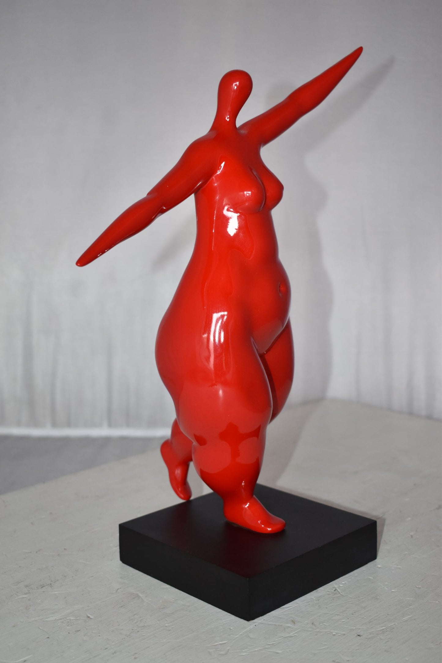 Modern Art Voluptuous Red Lady Hand Up Resin Statue Size: 14" x 5" x 16"H