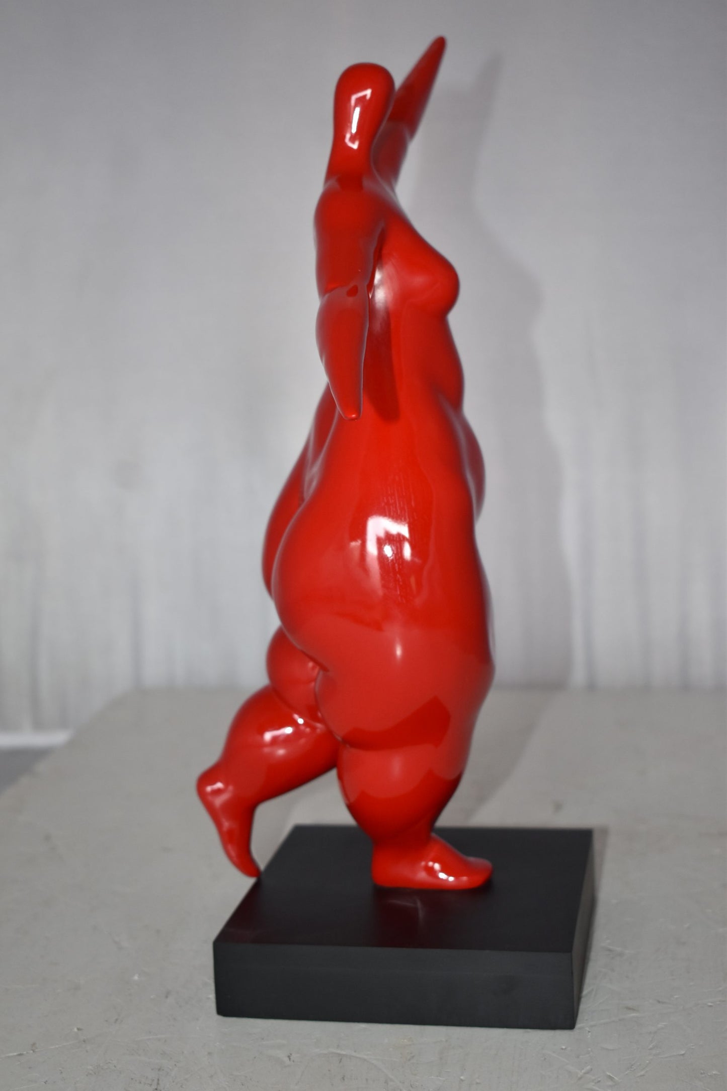 Modern Art Voluptuous Red Lady Hand Up Resin Statue Size: 14" x 5" x 16"H