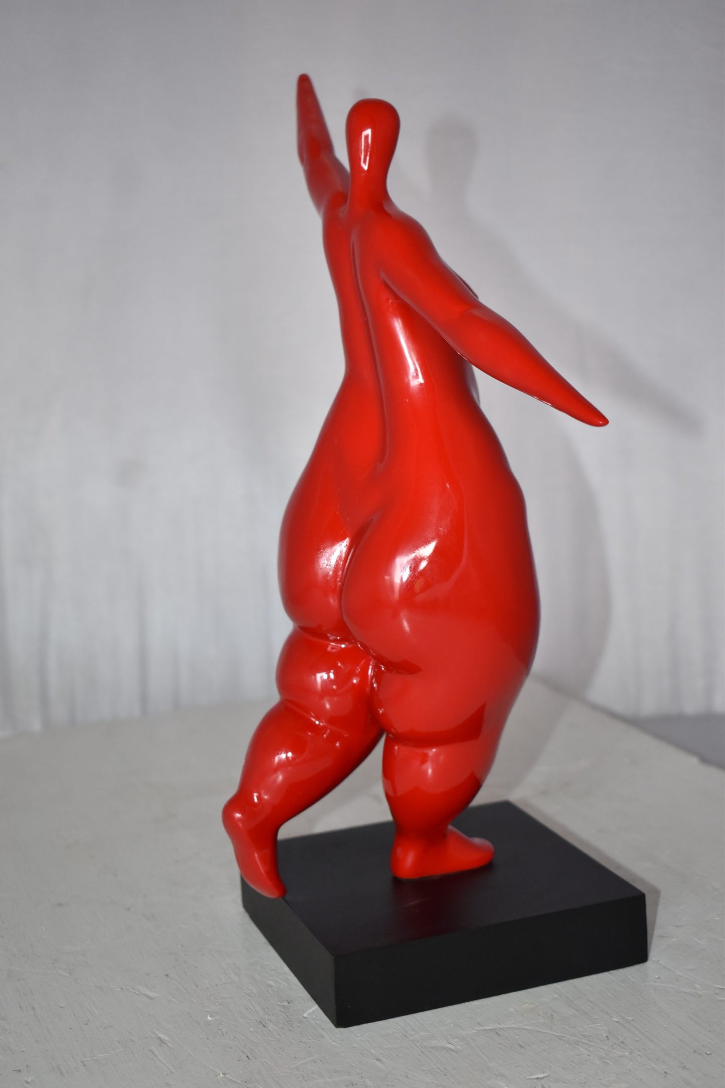 Modern Art Voluptuous Red Lady Hand Up Resin Statue Size: 14" x 5" x 16"H