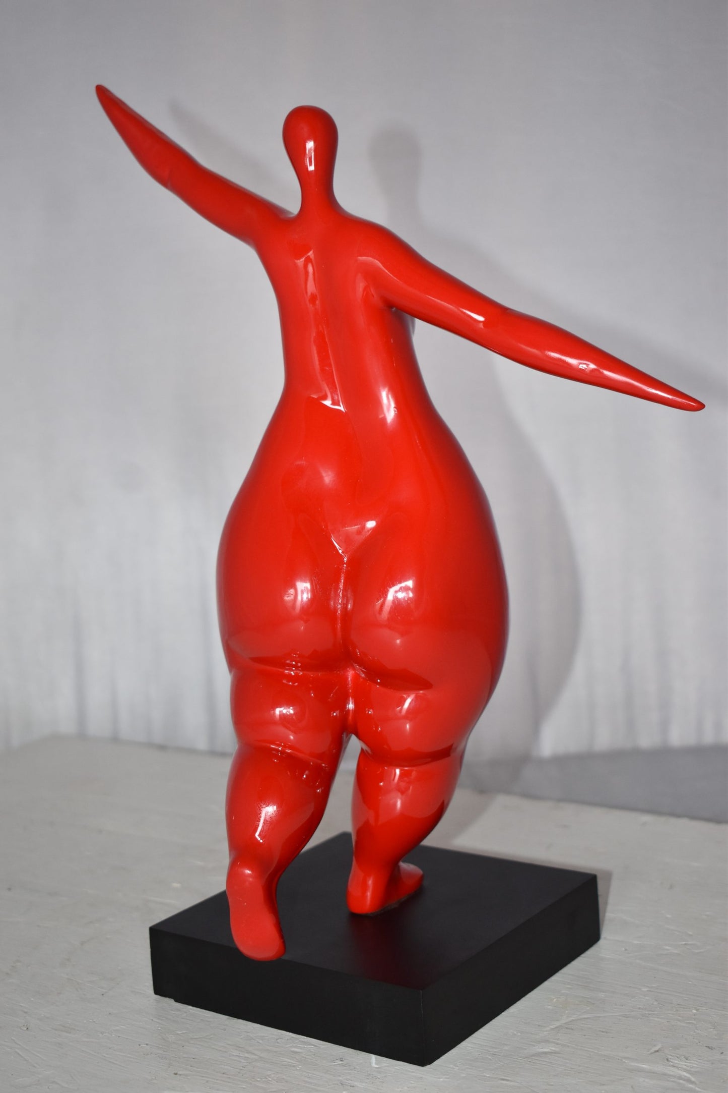 Modern Art Voluptuous Red Lady Hand Up Resin Statue Size: 14" x 5" x 16"H