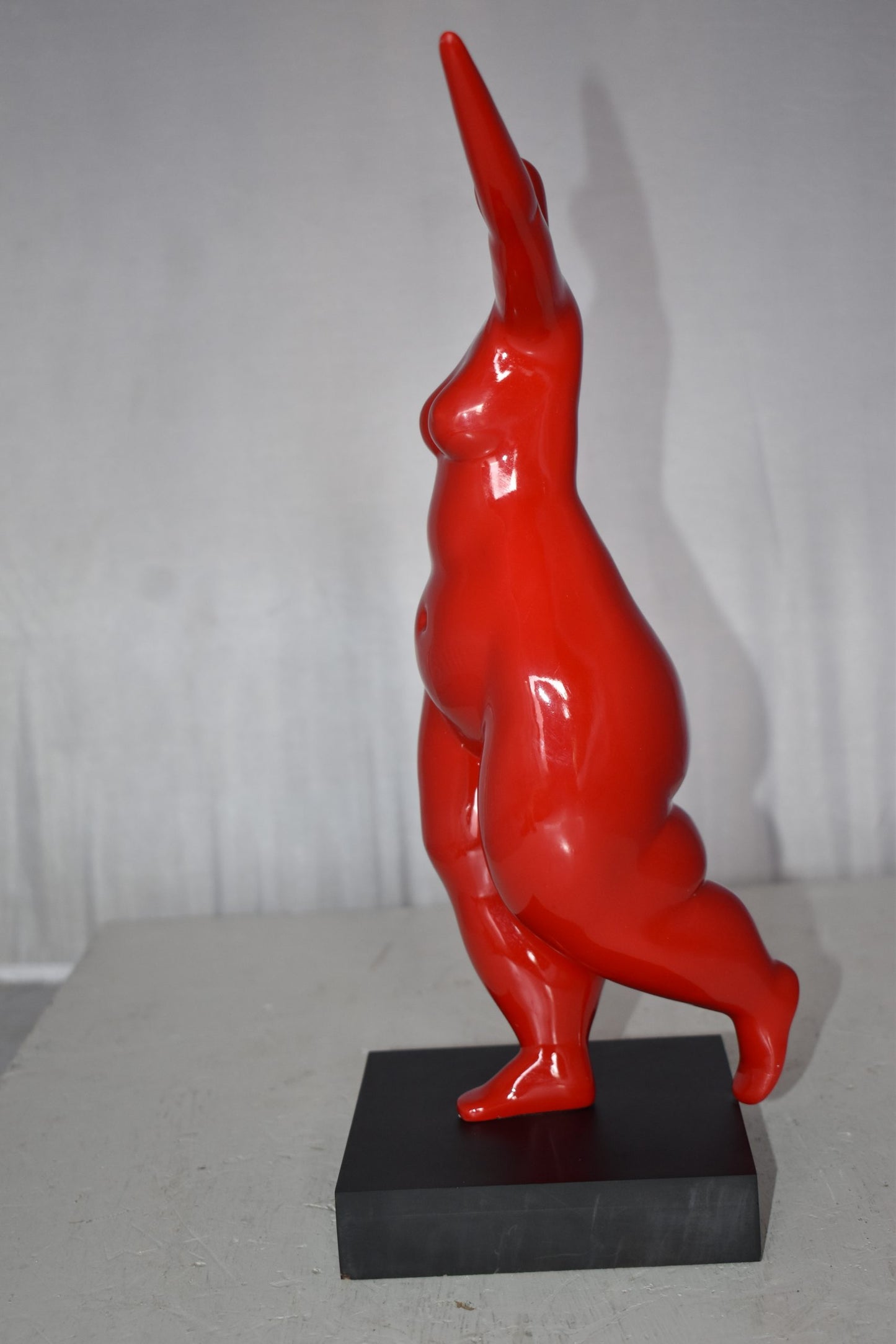 Modern Art Voluptuous Red Lady Hand Up Resin Statue Size: 14" x 5" x 16"H