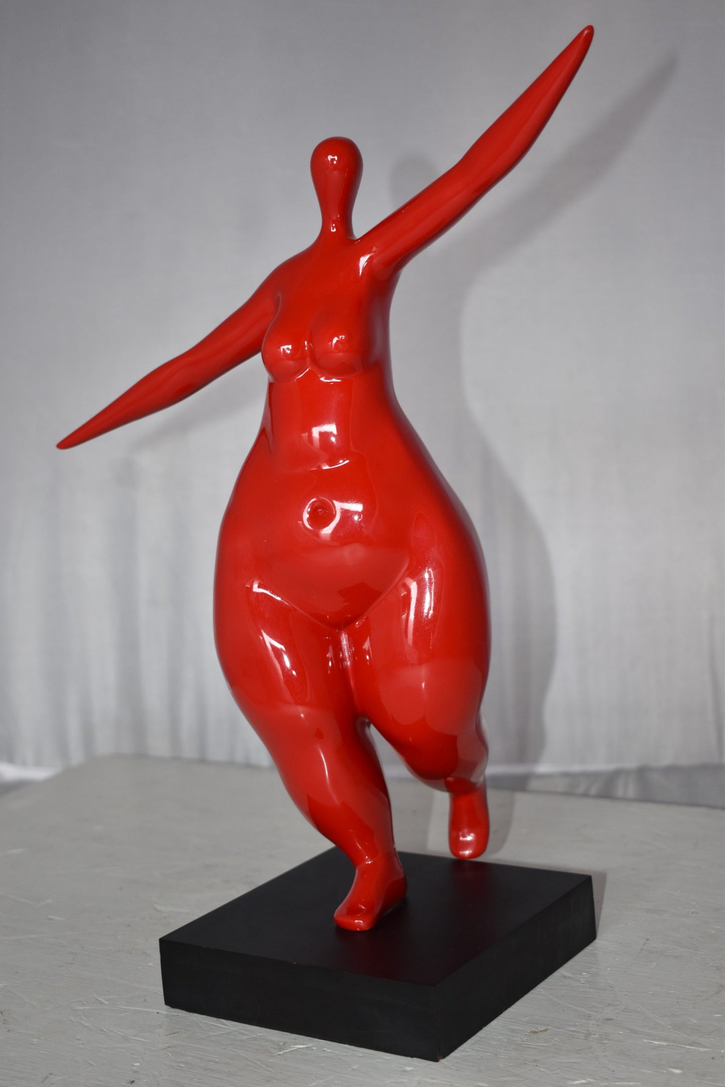Modern Art Voluptuous Red Lady Hand Up Resin Statue Size: 14" x 5" x 16"H