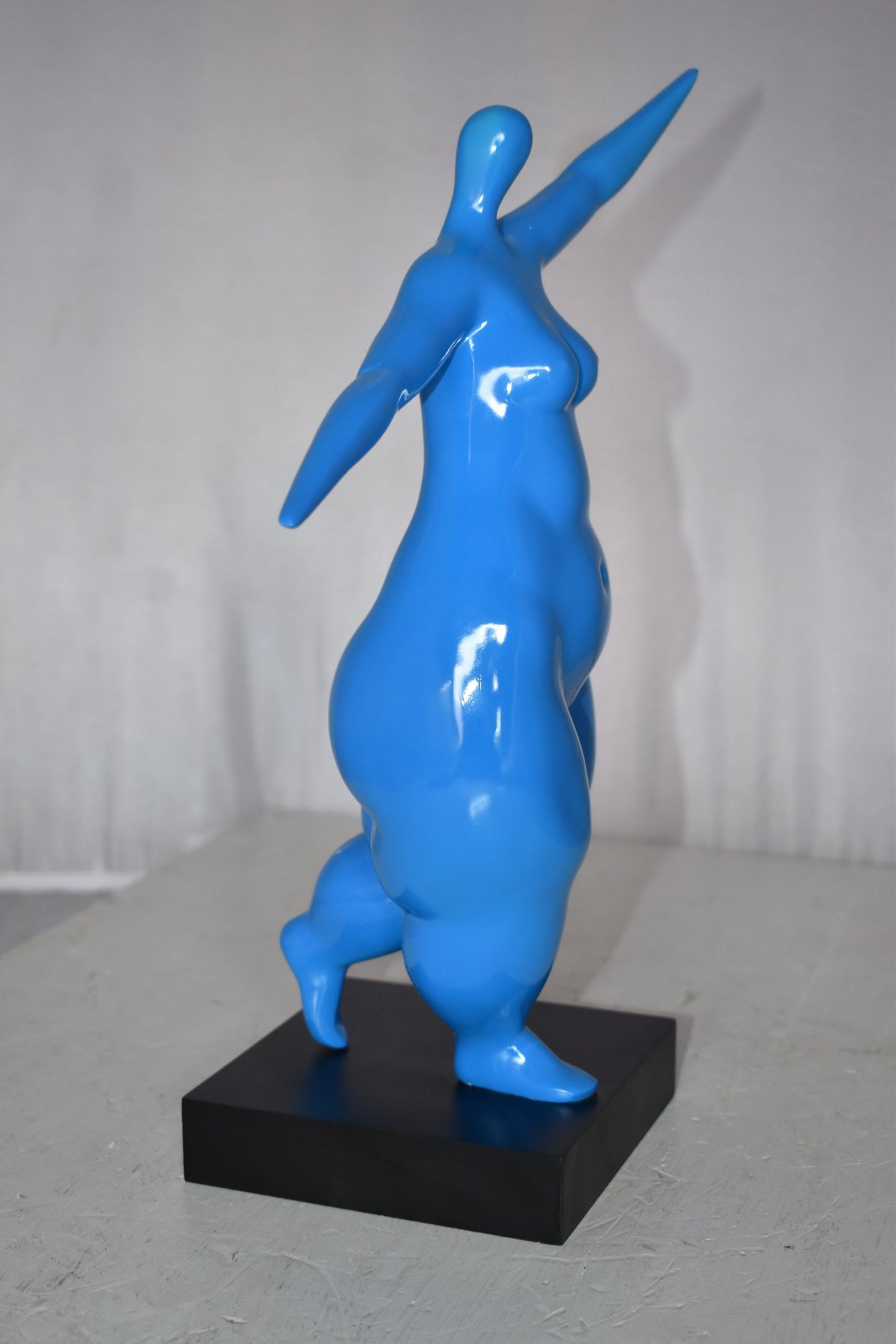 Modern Art Voluptuous Blue Lady Hand Up Resin Statue Size: 14" x 5" x 16"H
