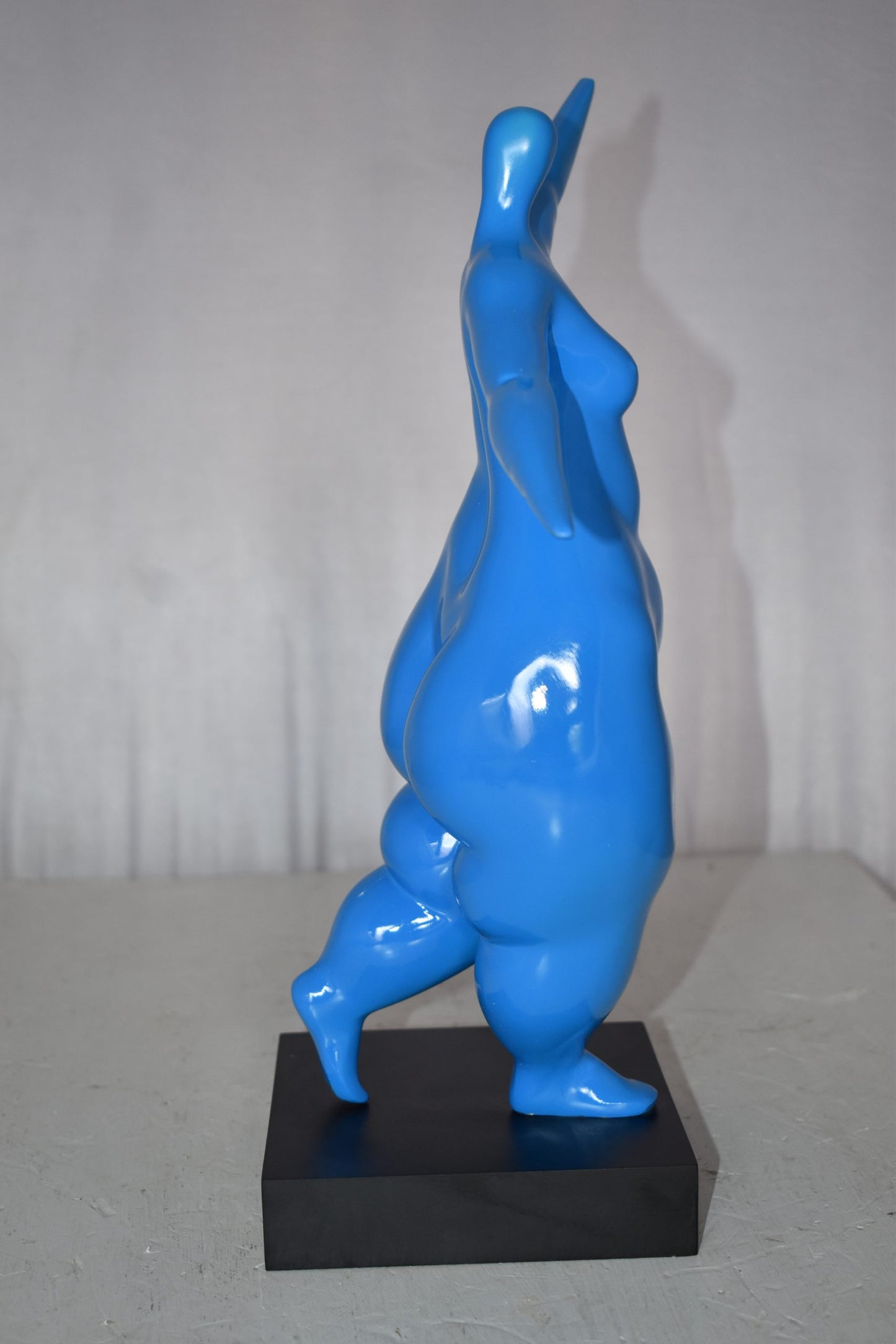 Modern Art Voluptuous Blue Lady Hand Up Resin Statue Size: 14" x 5" x 16"H