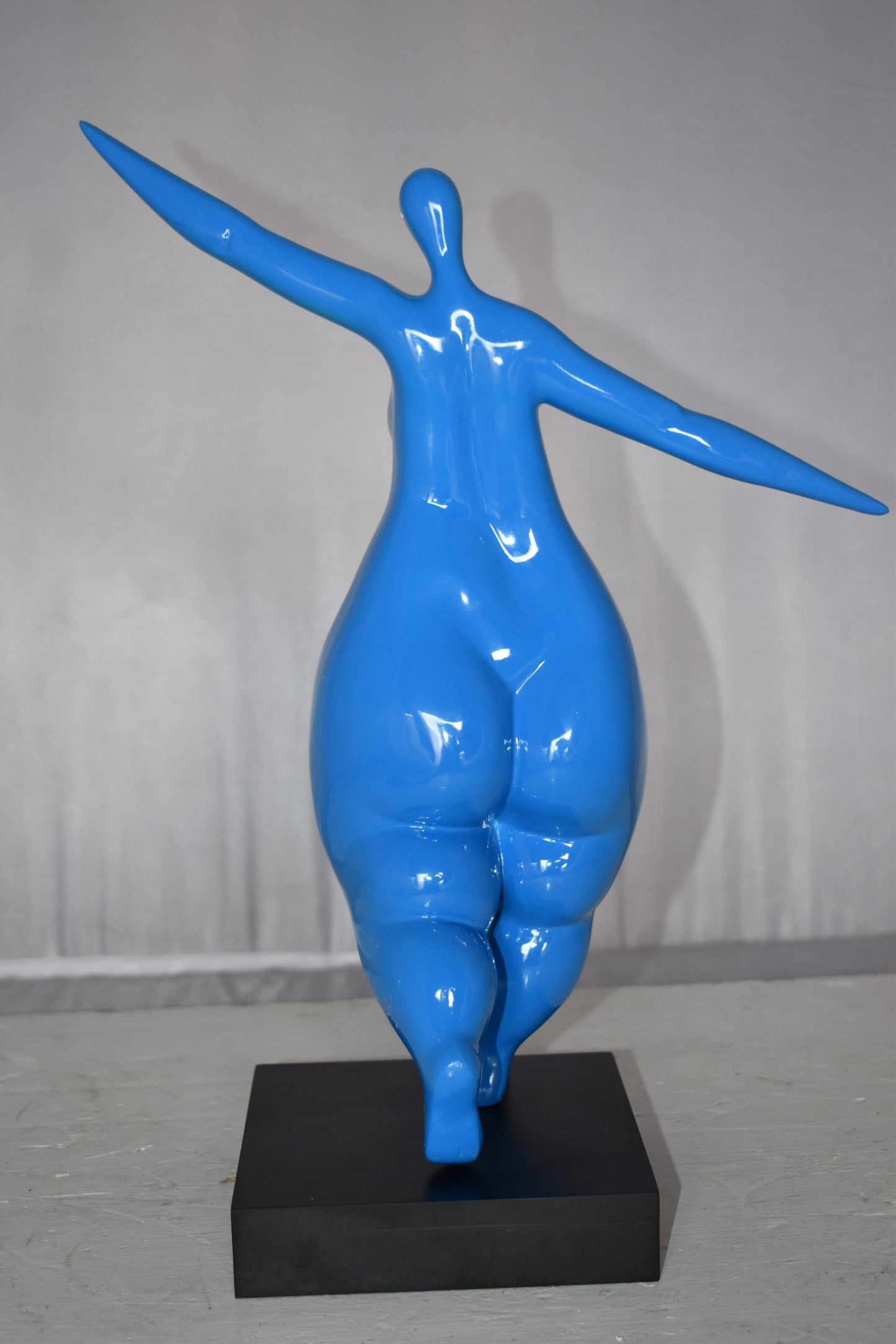 Modern Art Voluptuous Blue Lady Hand Up Resin Statue Size: 14" x 5" x 16"H