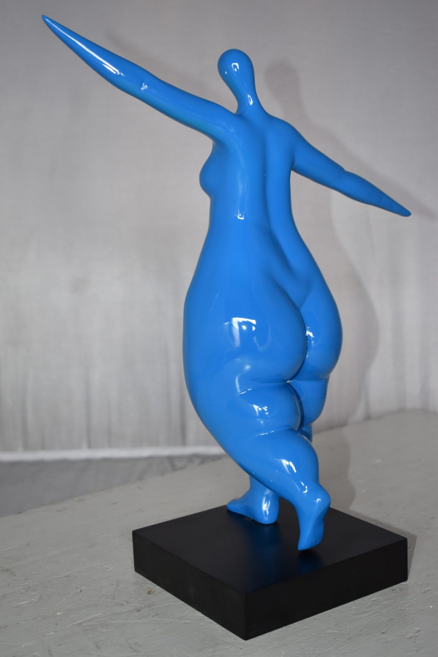 Modern Art Voluptuous Blue Lady Hand Up Resin Statue Size: 14" x 5" x 16"H