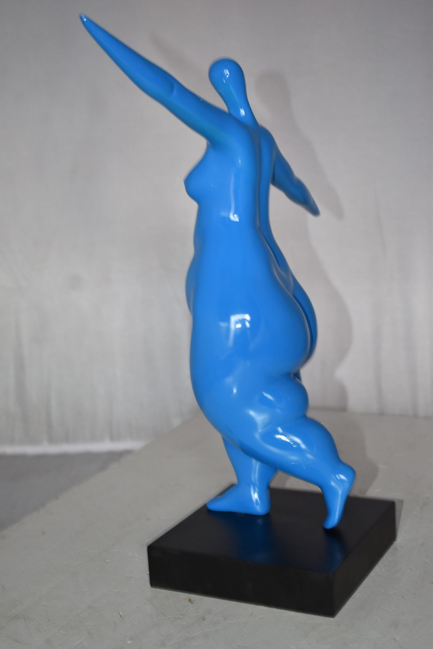 Modern Art Voluptuous Blue Lady Hand Up Resin Statue Size: 14" x 5" x 16"H