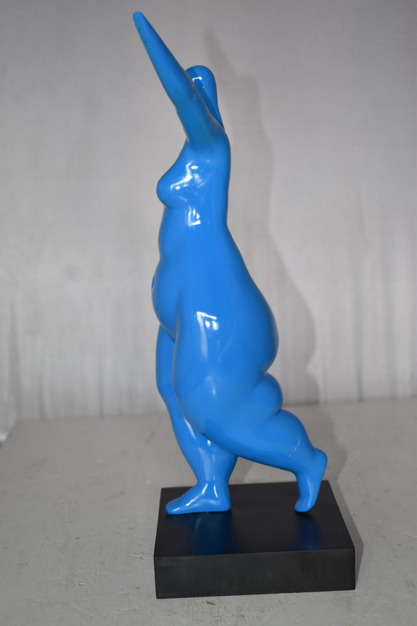 Modern Art Voluptuous Blue Lady Hand Up Resin Statue Size: 14" x 5" x 16"H