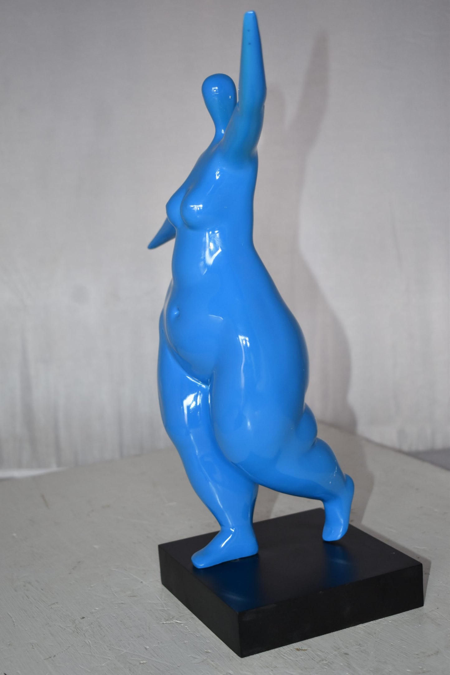 Modern Art Voluptuous Blue Lady Hand Up Resin Statue Size: 14" x 5" x 16"H