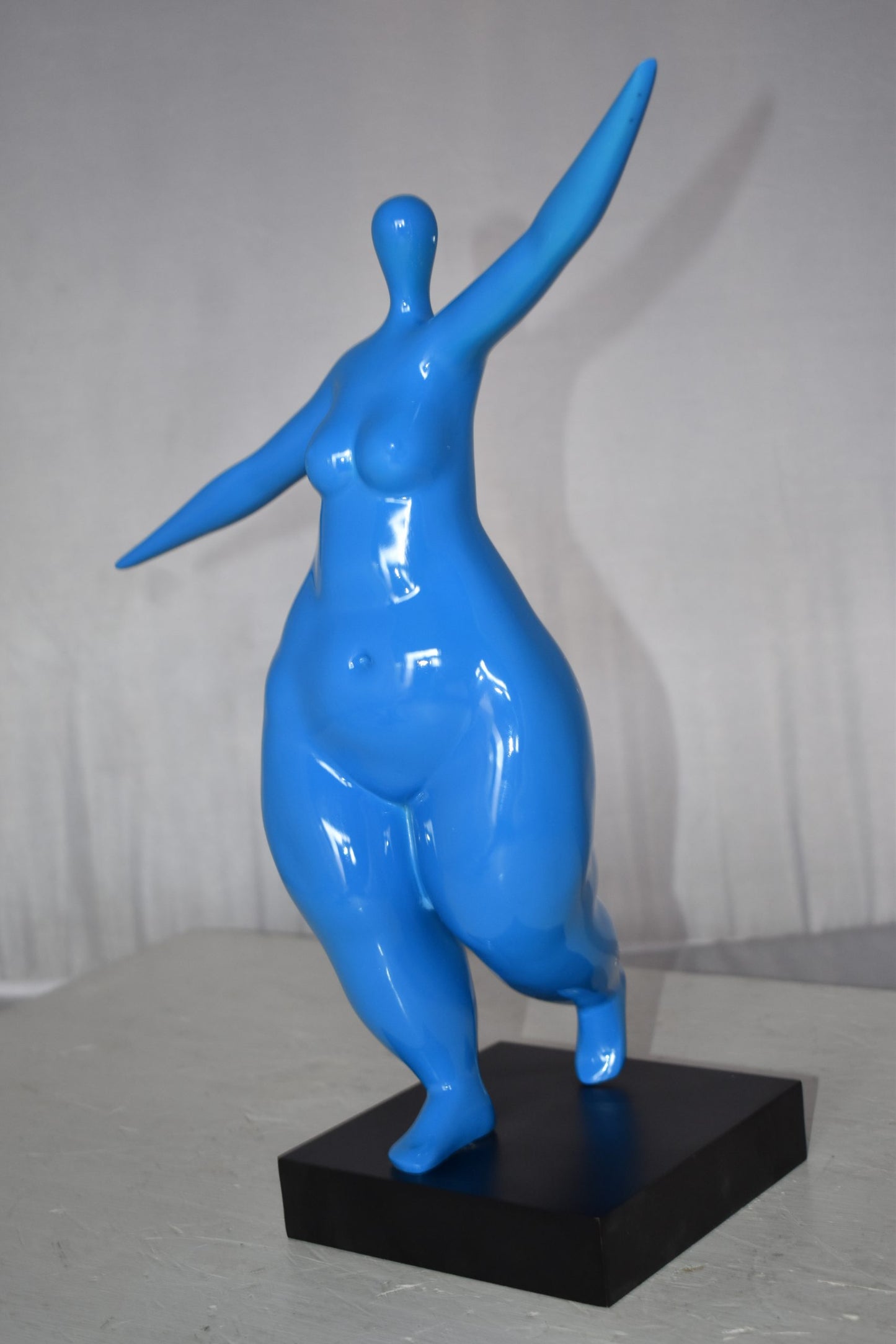 Modern Art Voluptuous Blue Lady Hand Up Resin Statue Size: 14" x 5" x 16"H