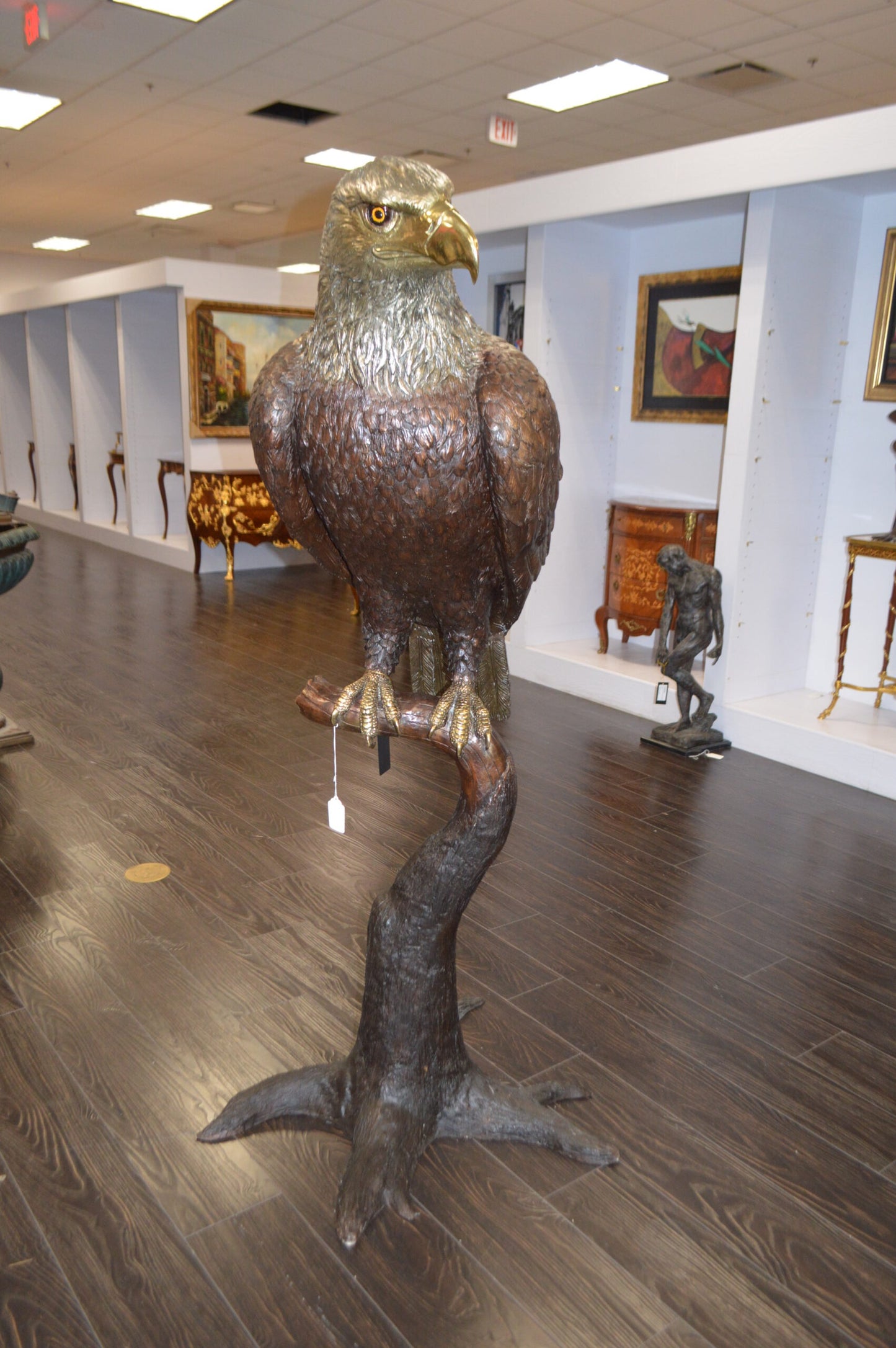 Large Eagle Standing On A Branch Bronze Statue - Size: 30"L x 40"W x 70"H.
