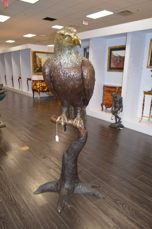Large Eagle Standing On A Branch Bronze Statue - Size: 30"L x 40"W x 70"H.