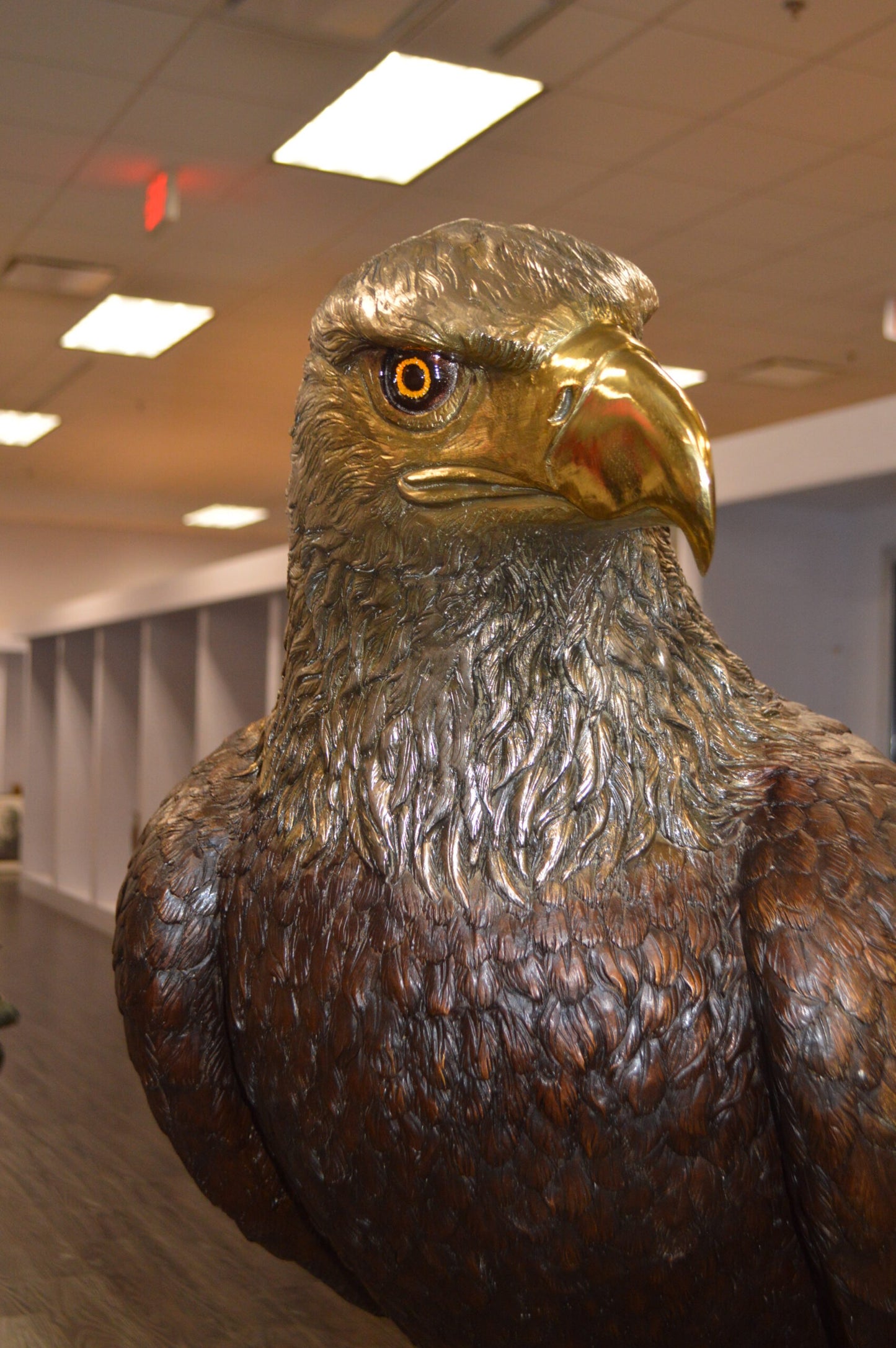Large Eagle Standing On A Branch Bronze Statue - Size: 30"L x 40"W x 70"H.
