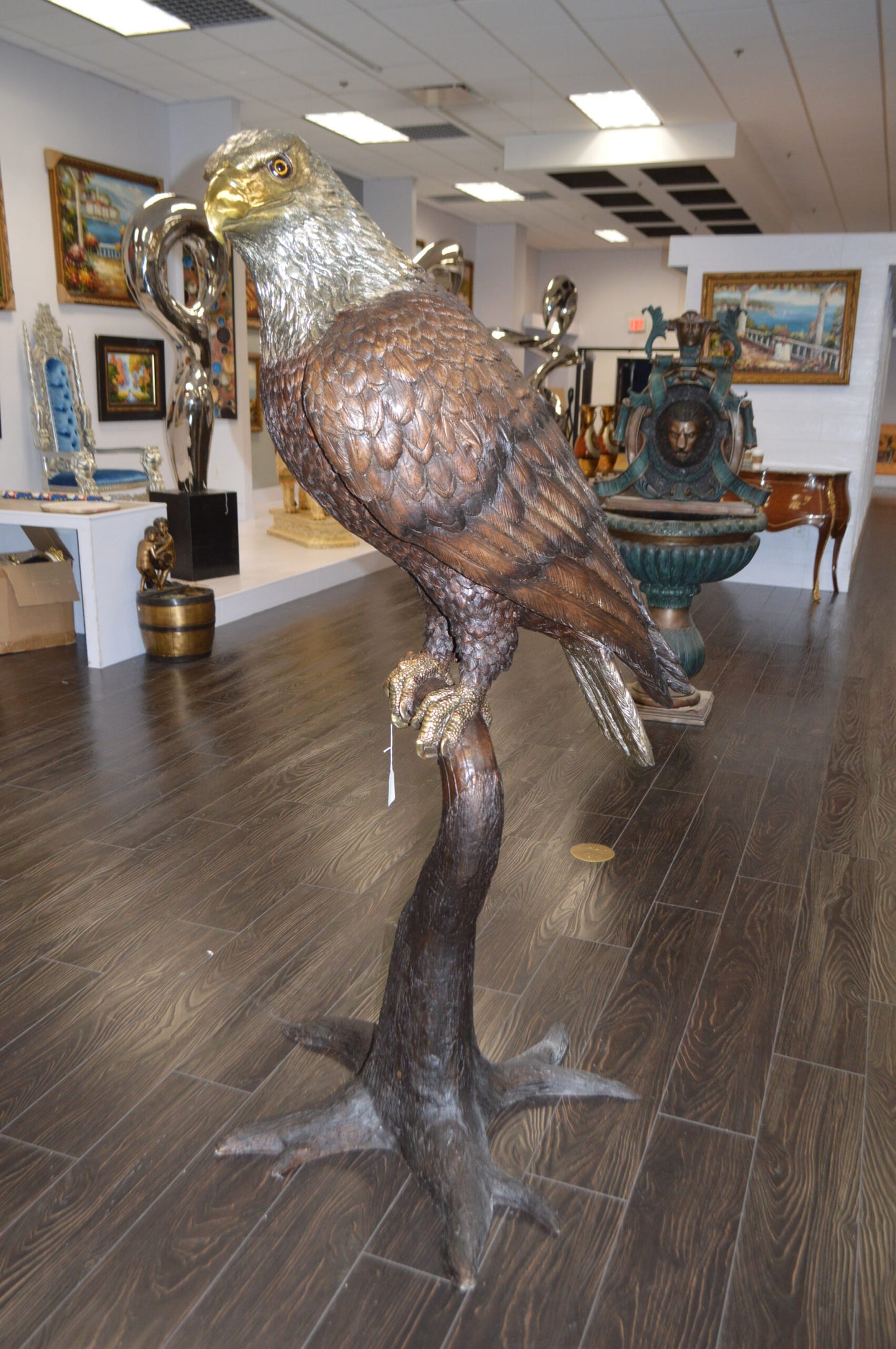 Large Eagle Standing On A Branch Bronze Statue - Size: 30"L x 40"W x 70"H.