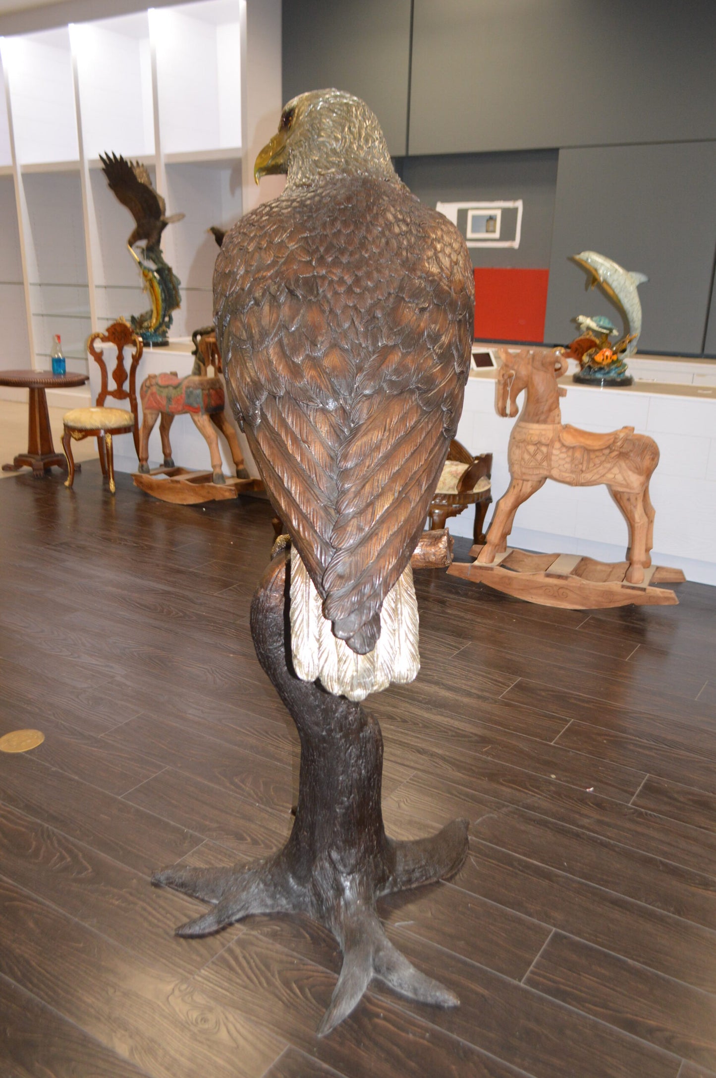 Large Eagle Standing On A Branch Bronze Statue - Size: 30"L x 40"W x 70"H.