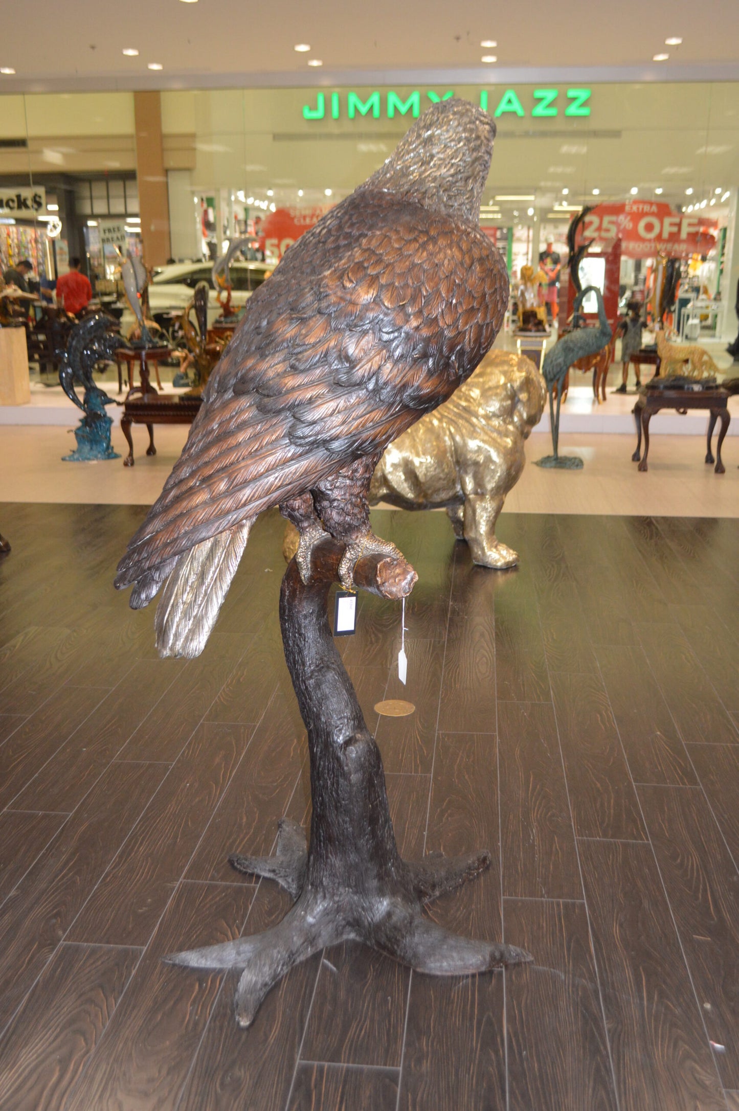 Large Eagle Standing On A Branch Bronze Statue - Size: 30"L x 40"W x 70"H.