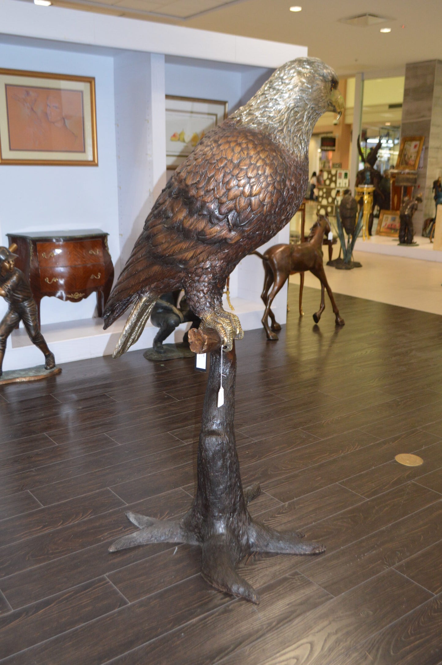 Large Eagle Standing On A Branch Bronze Statue - Size: 30"L x 40"W x 70"H.
