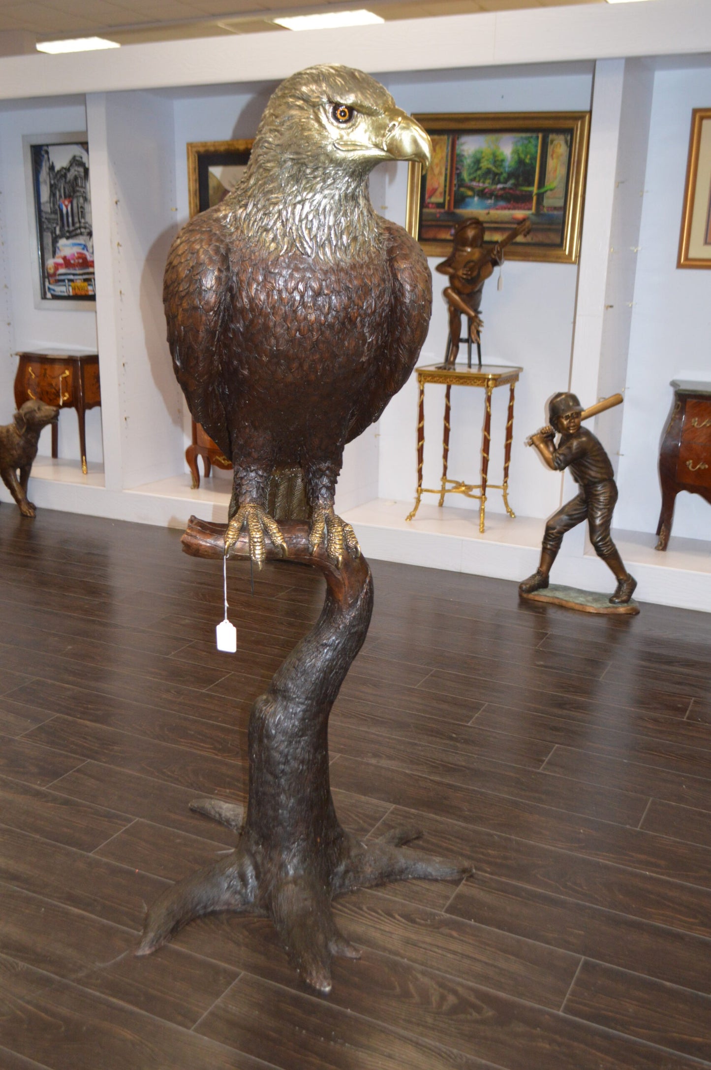 Large Eagle Standing On A Branch Bronze Statue - Size: 30"L x 40"W x 70"H.