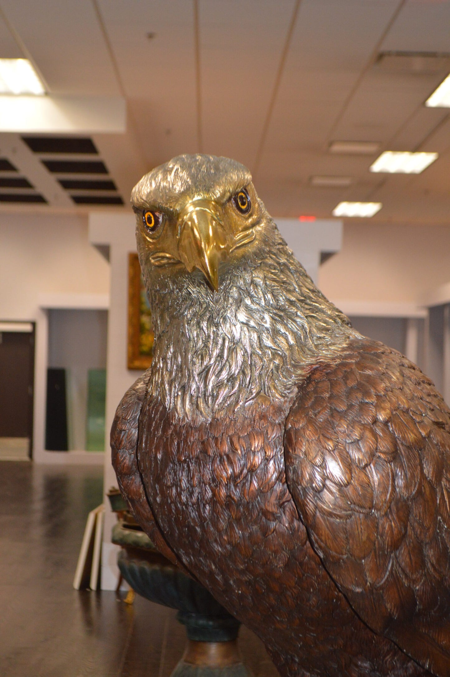 Large Eagle Standing On A Branch Bronze Statue - Size: 30"L x 40"W x 70"H.