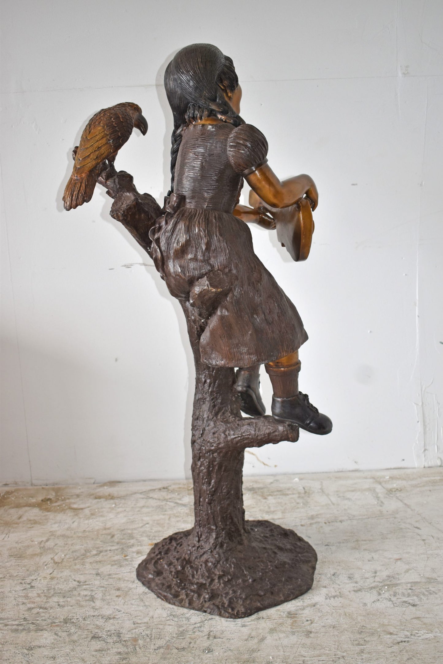 Girl on a Tree Playing the Ukulele with a Parrot Bronze Statue 25" x 23" x 50"H