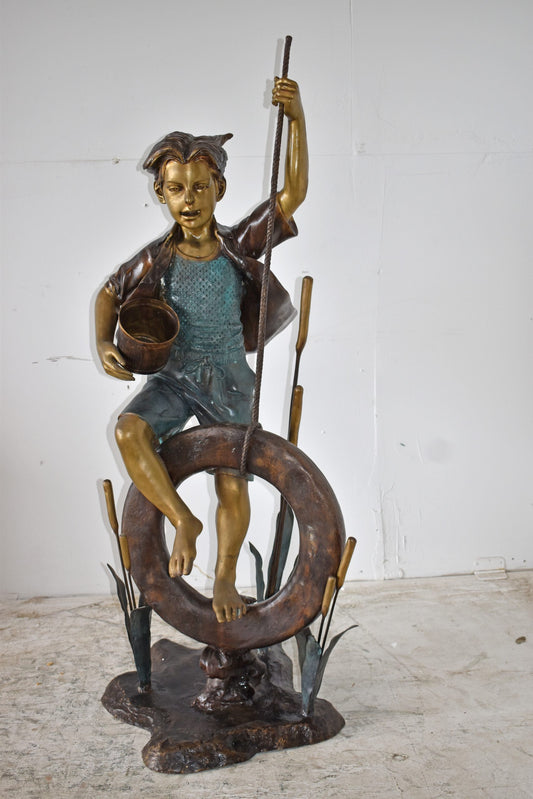Pirate Sitting on a Life Saver Wheel Bronze Statue Size: 24" x 28" x 57"H