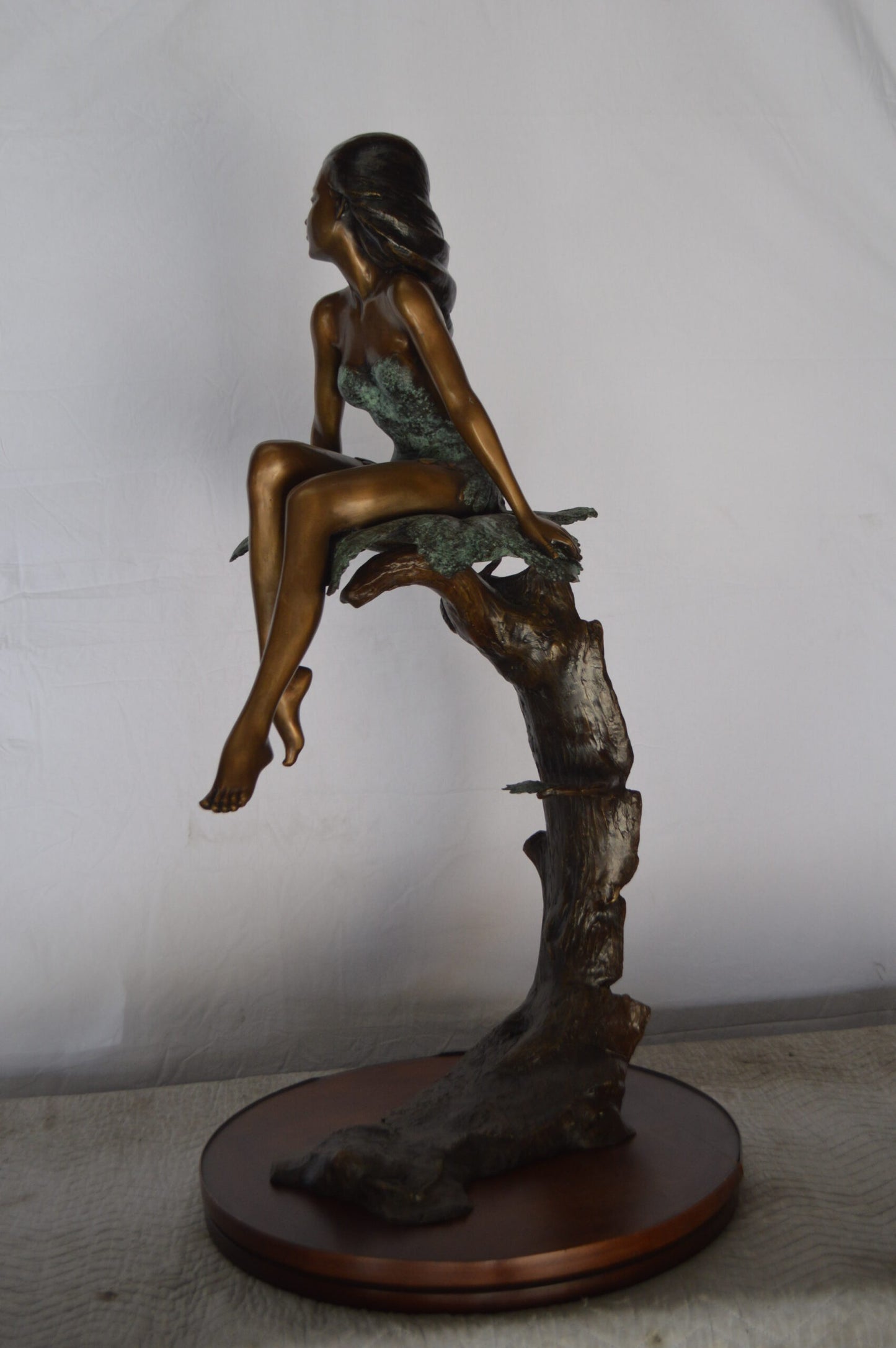 Girl on Maple Leaf Bronze Statue - Size: 23"L x 18"W x 44"H.