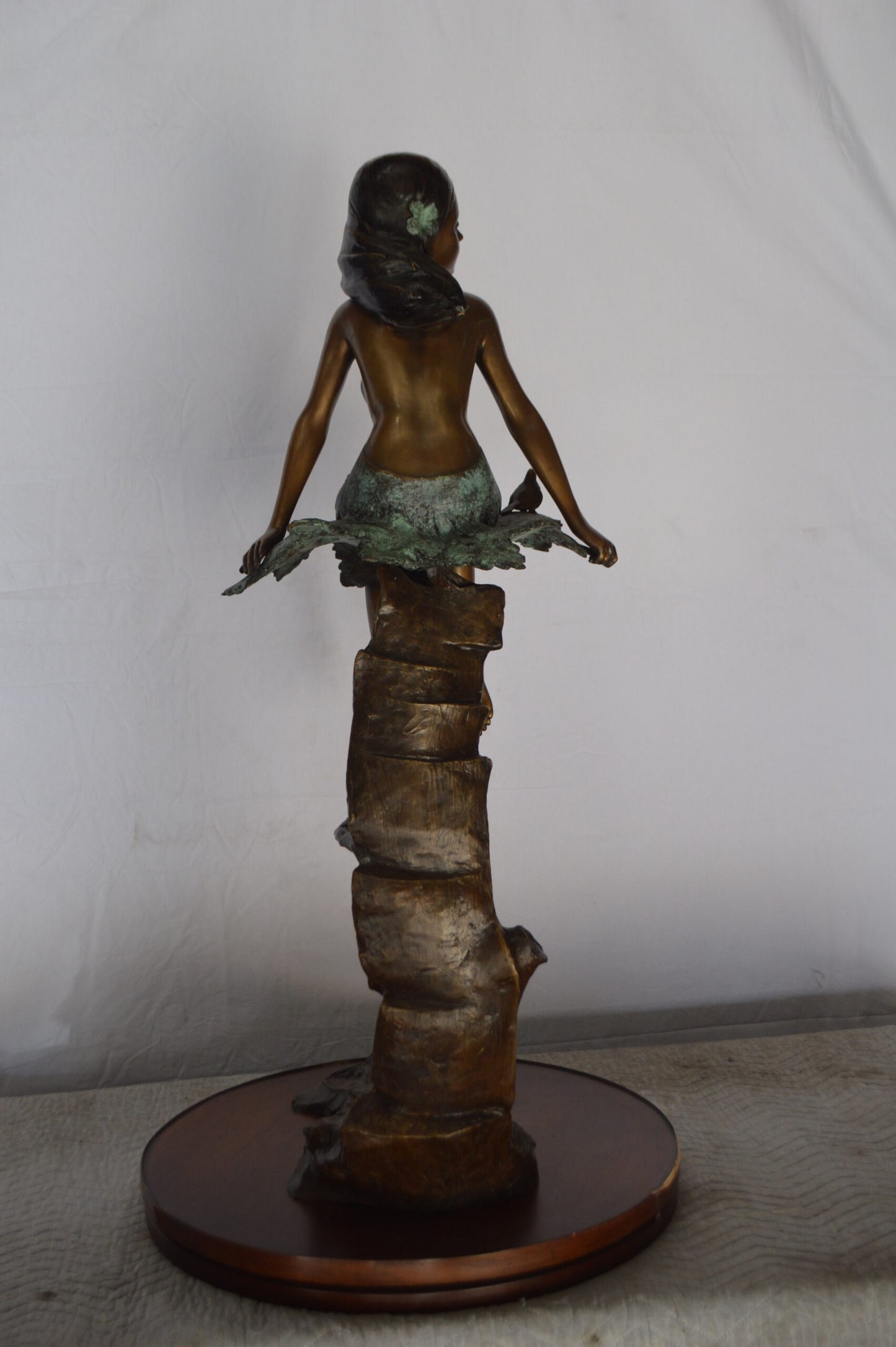 Girl on Maple Leaf Bronze Statue -  Size: 23"L x 18"W x 44"H.