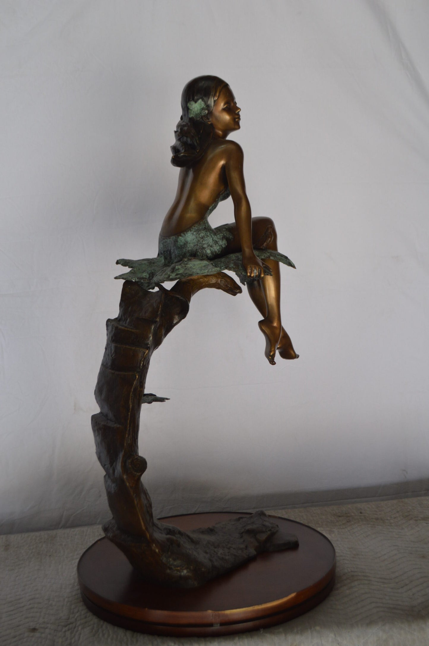 Girl on Maple Leaf Bronze Statue - Size: 23"L x 18"W x 44"H.