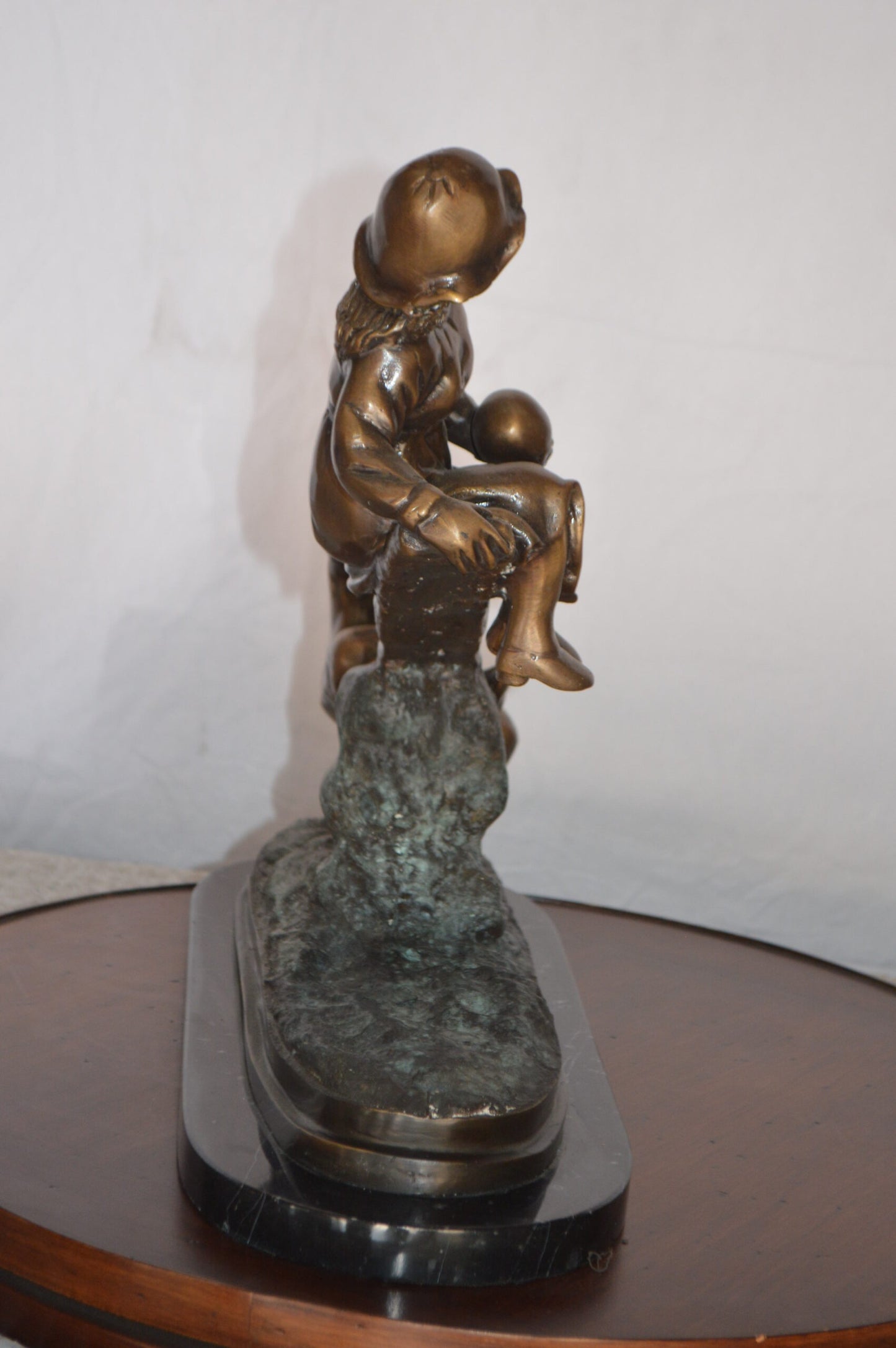 Boys Playing Seesaw on a Marble Base Bronze Statue - Size: 22"L x 8"W x 17"H.