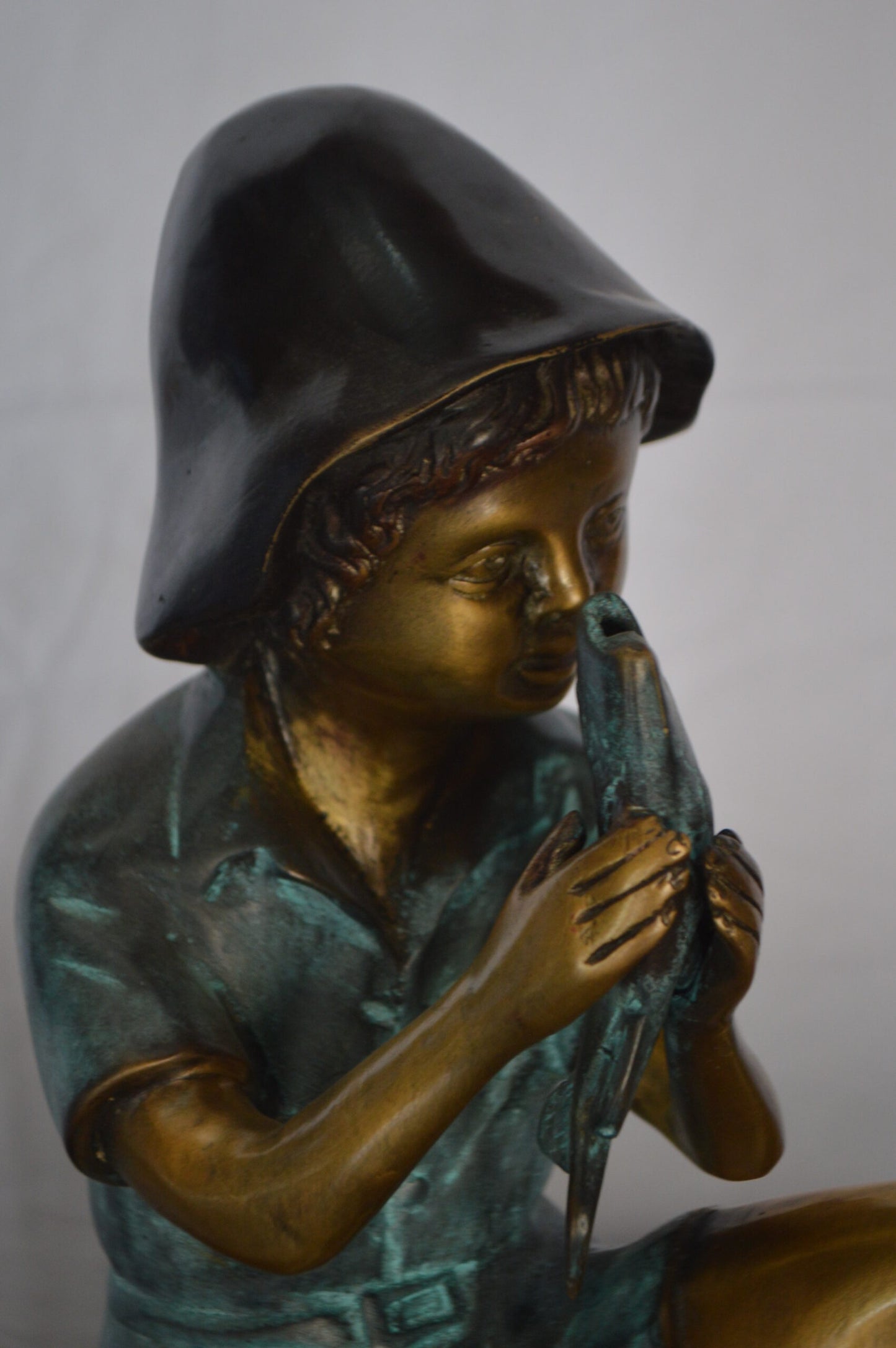 Boy Holding a Fish Bronze Statue Fountain - Size: 8"L x 9"W x 18"H.