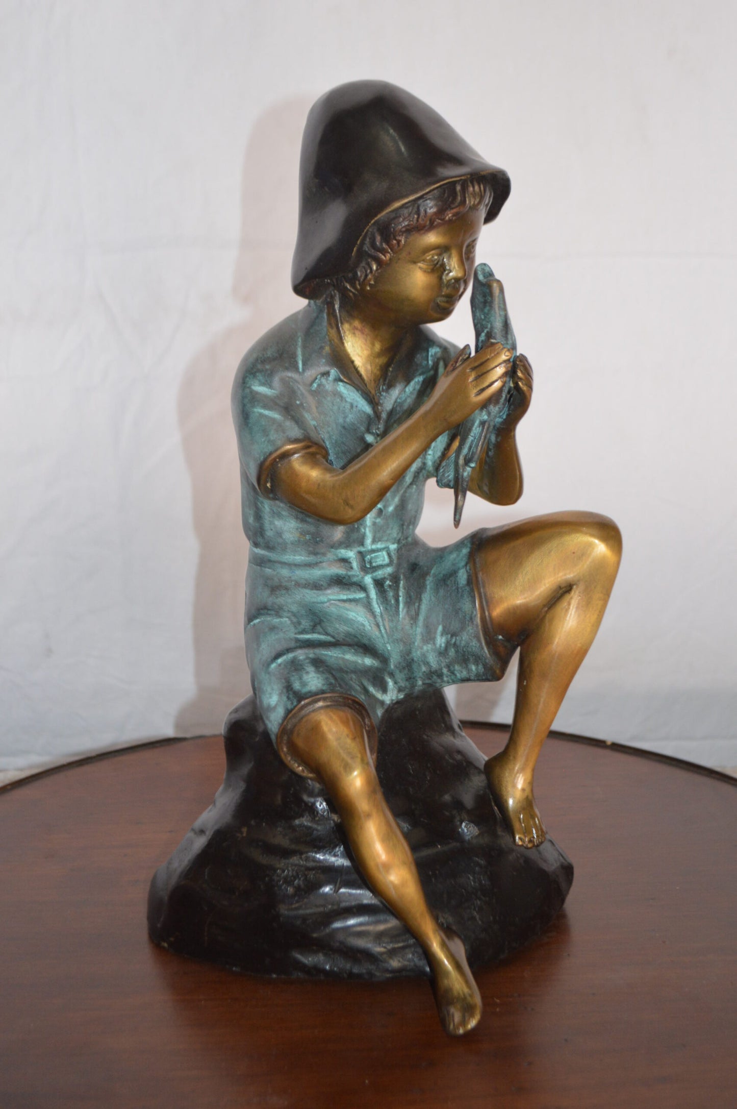 Boy Holding a Fish Bronze Statue Fountain - Size: 8"L x 9"W x 18"H.