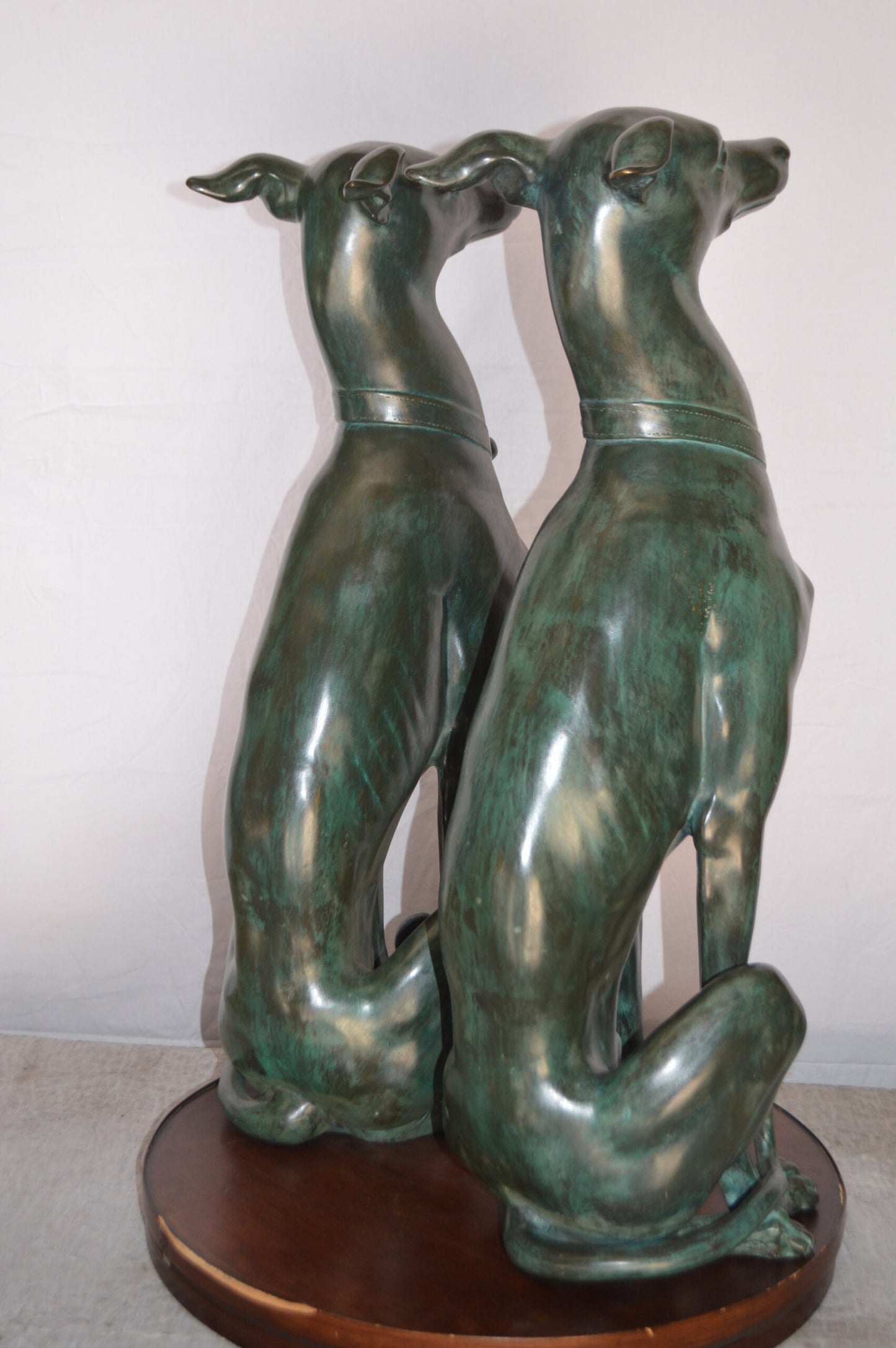 Pair of Greyhound dogs sitting Bronze Statue - Size: 12"L x 12"W x 35"H.