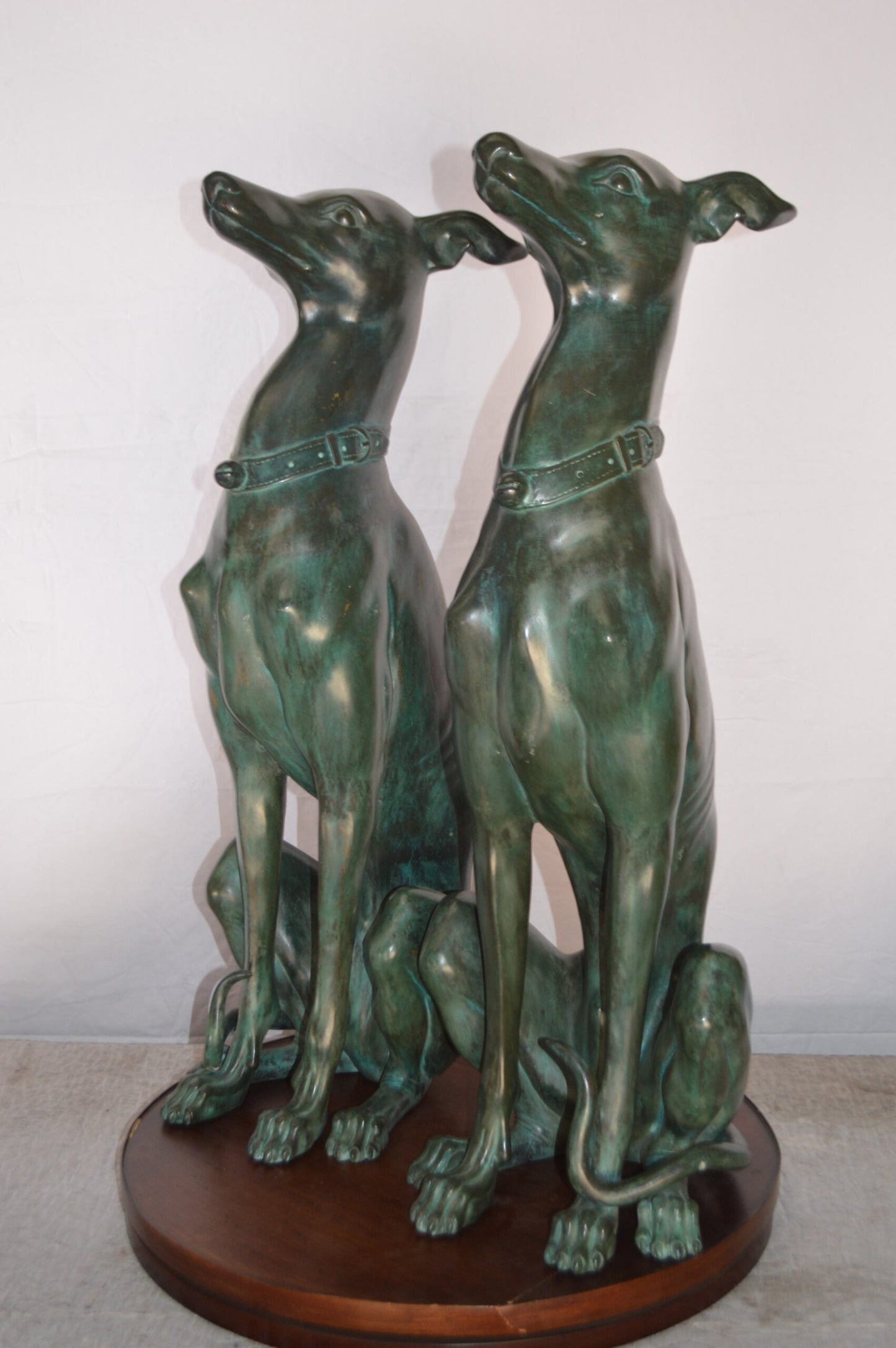 Pair of Greyhound dogs sitting Bronze Statue - Size: 12"L x 12"W x 35"H.