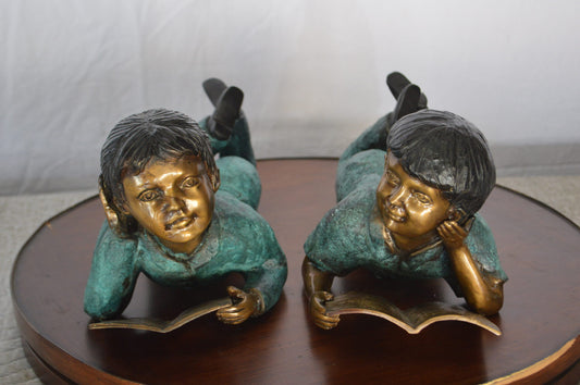 Set of a Boy and a Girl Reading a Book Bronze Statue -  Size: 16"L x 7"W x 8"H.