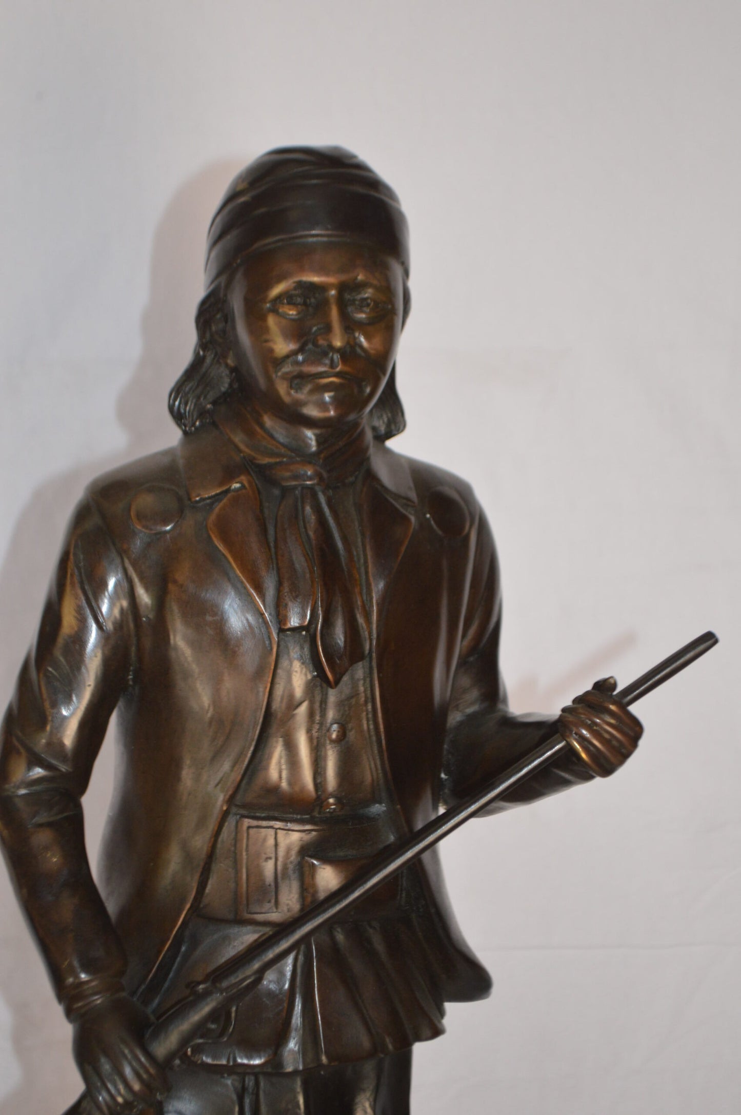 Geronimo Bronze Statue Mounted on a Marble Base - Size: 10"L x 8"W x 31"H.
